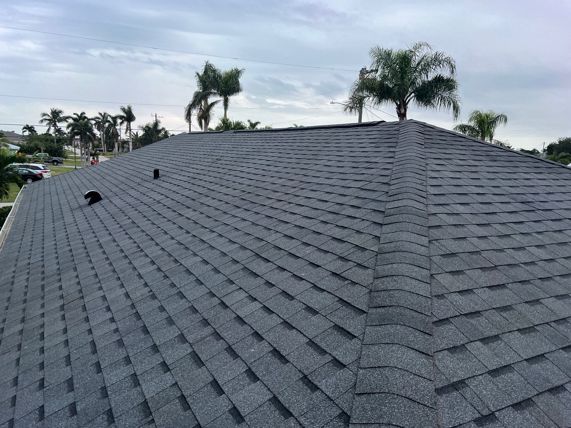 Residential Roofing Installation using Pinnacle Pristine Shingle in Pewter Gray by Durabilis Roofing INC