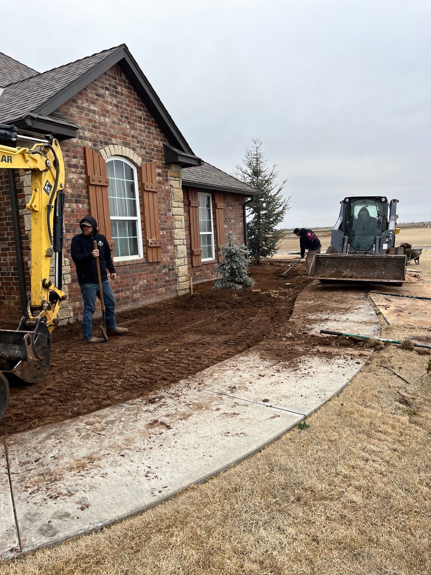 Landscape installation w/ irrigation and landscape lighting by Clays Services Inc