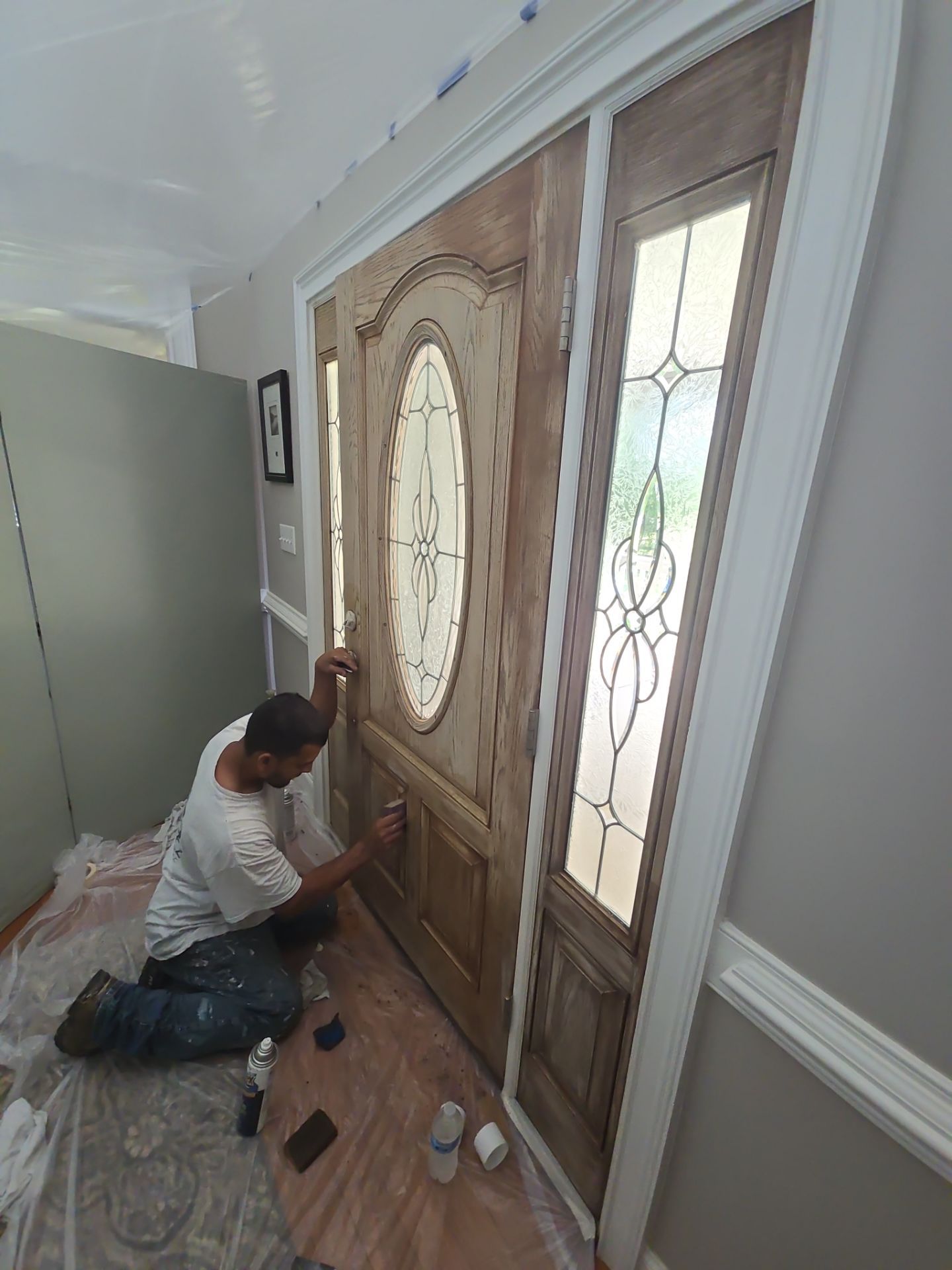 Siding replacement, exterior painting, and front door staining. by GonzalezPainters & Contractors Inc
