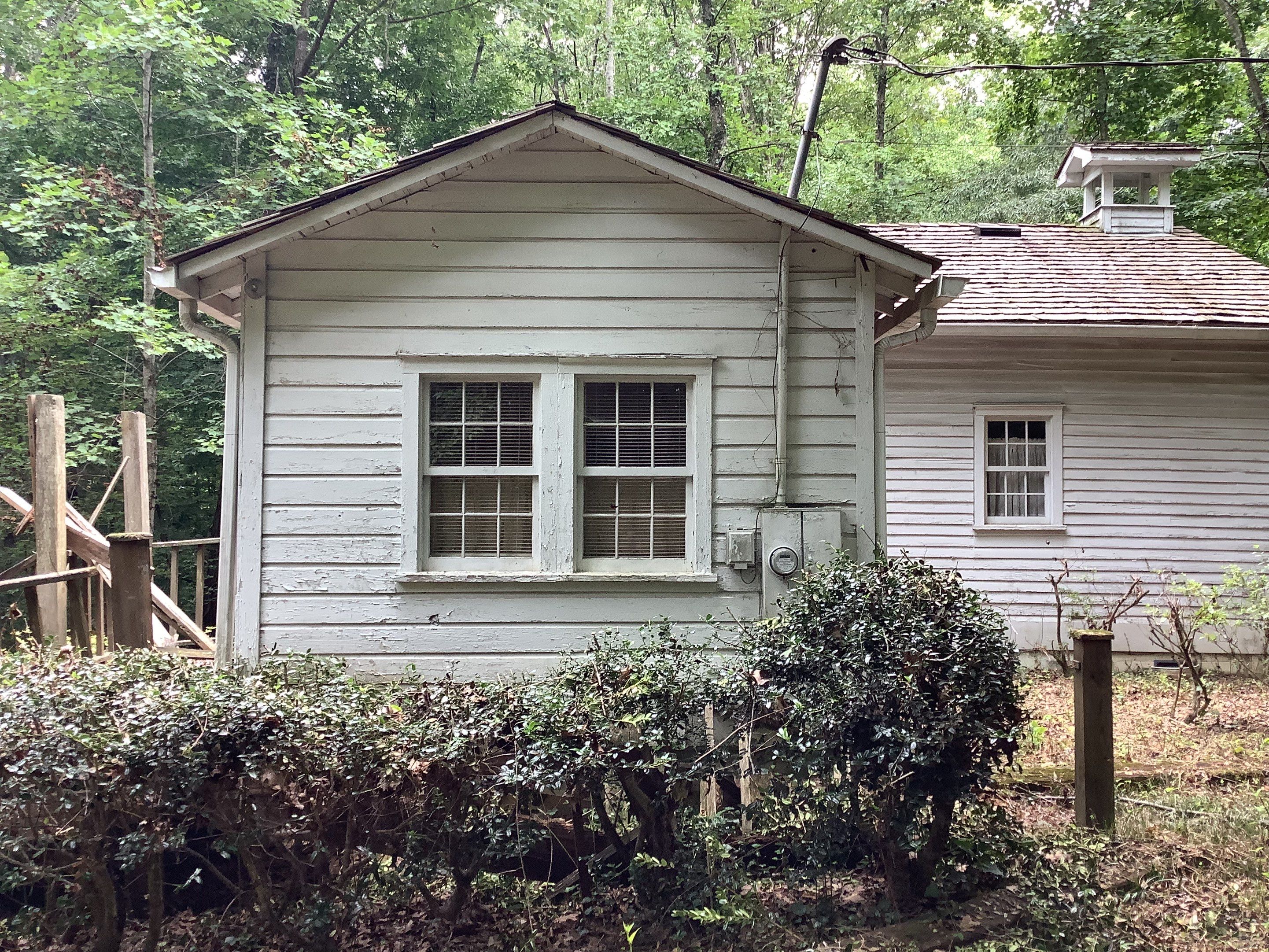 Exterior Painting and Siding Refresh for Kennesaw Historic Structure by Swift Home Renovations