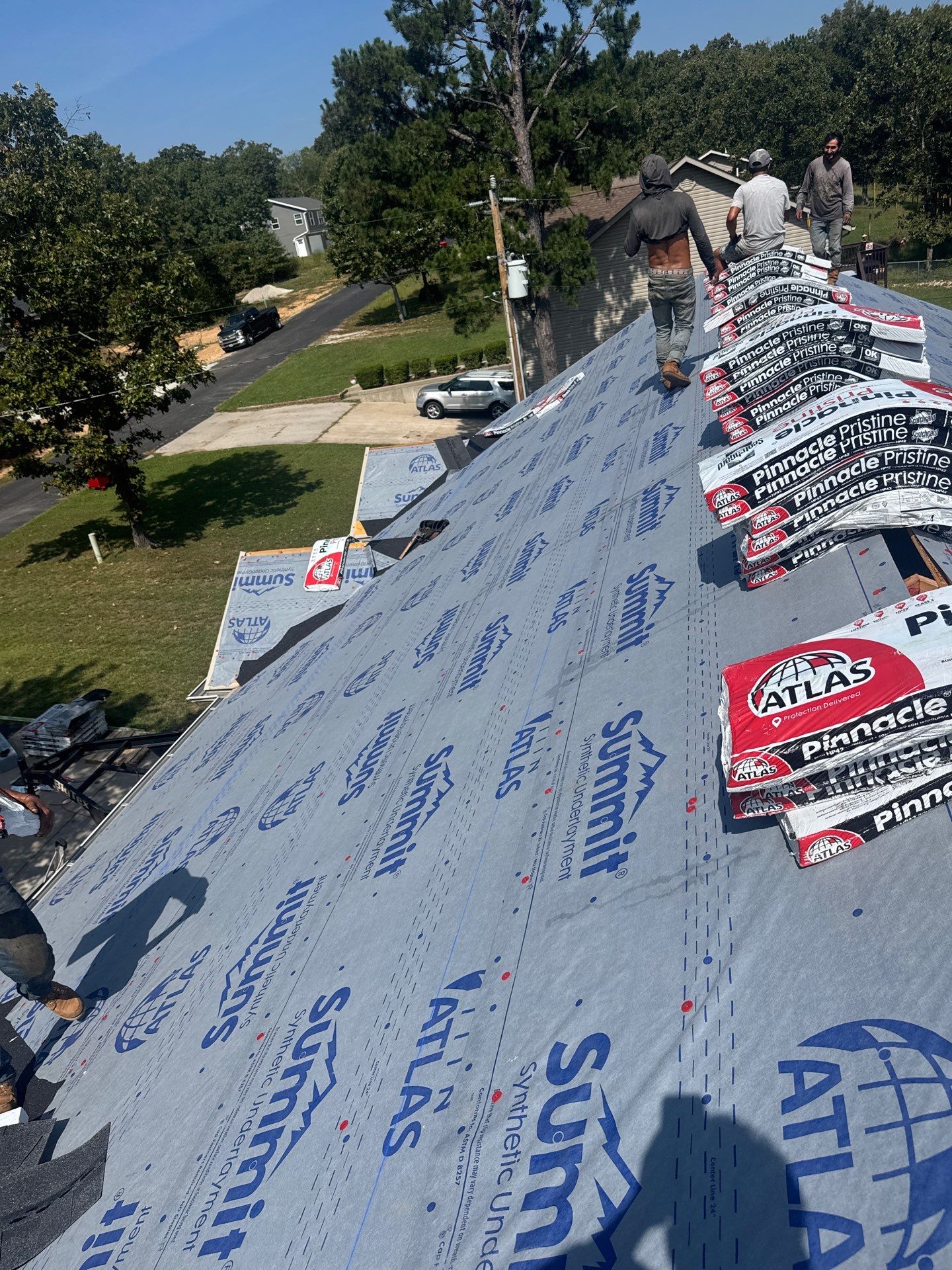 Residential Roof + Gutter & Downspout Install  by Titan Commercial & Residential Roofing 