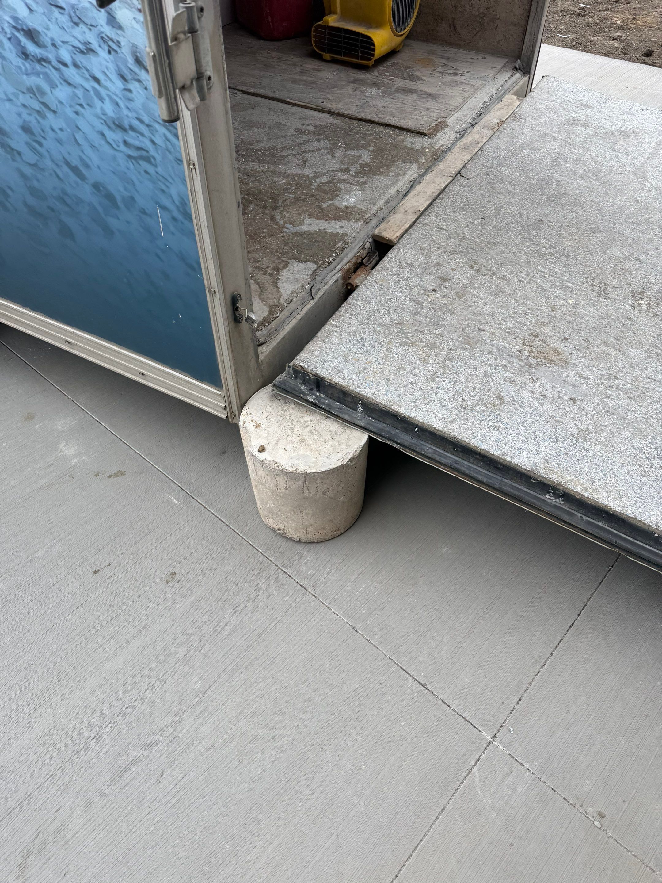 Multi-Car Garage Epoxy Floor Coating and Concrete Finishing in Sioux Falls by Select Painting, Coatings & Garage Cabinets