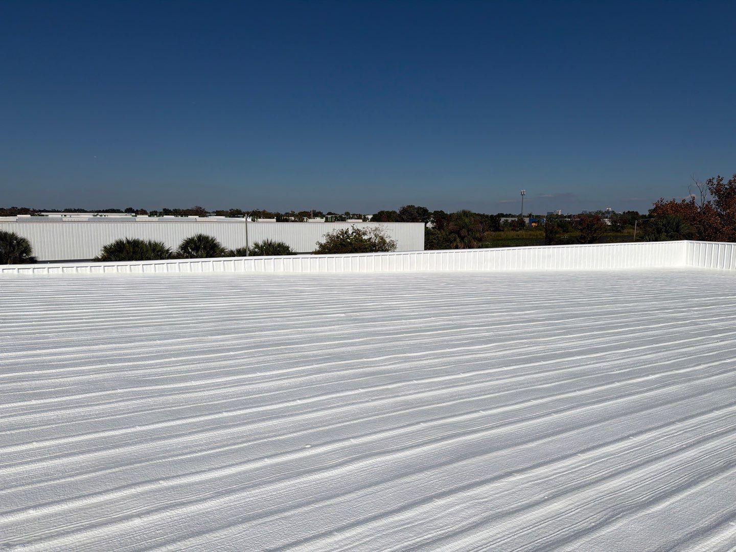 Orlando Commercial Metal Roof Restoration and Silicone Coating System by CES Roofing