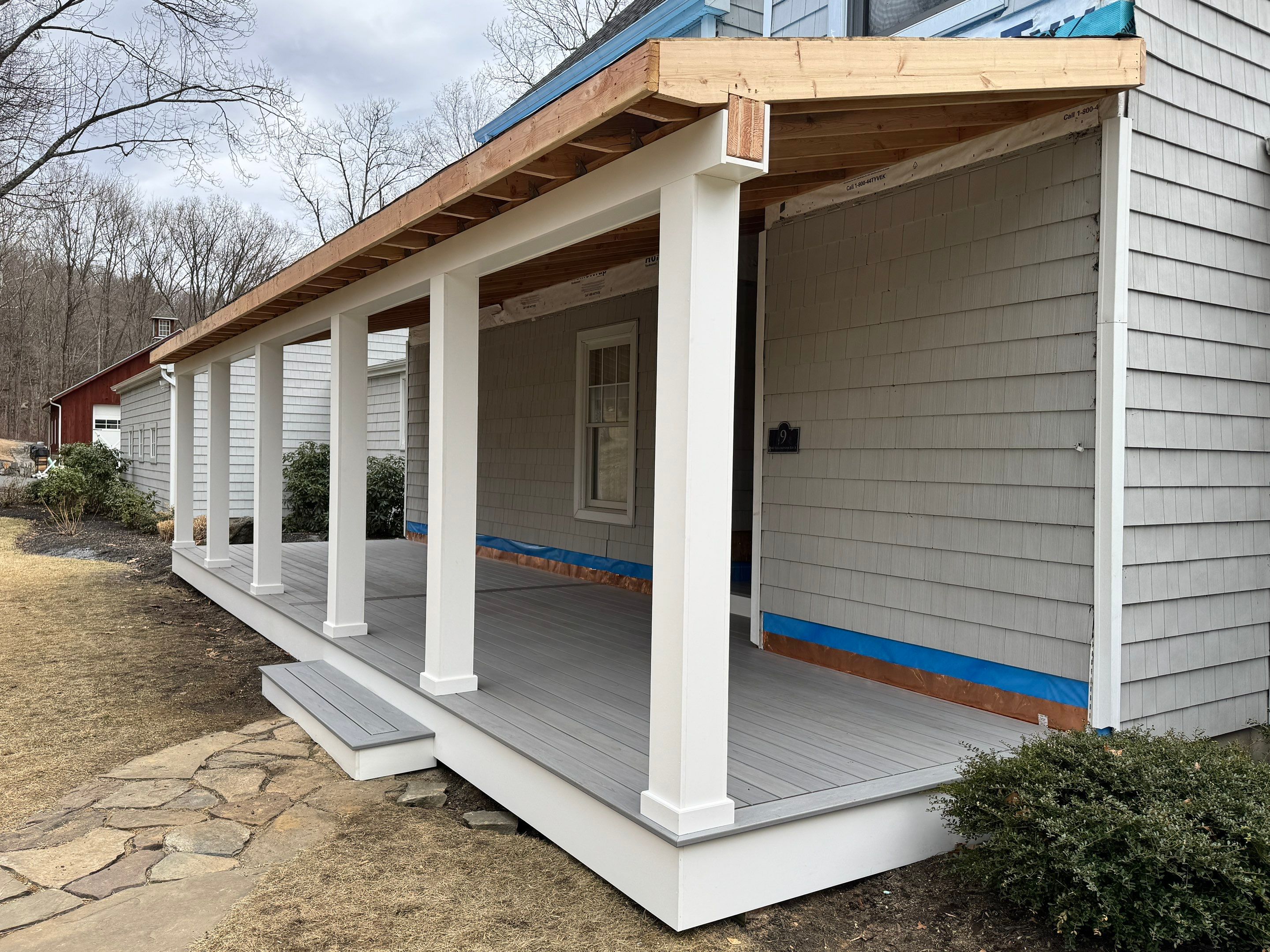 New Front and Back Trex Deck In Lineage color Rainier by DiGiorgi Roofing and Siding Inc