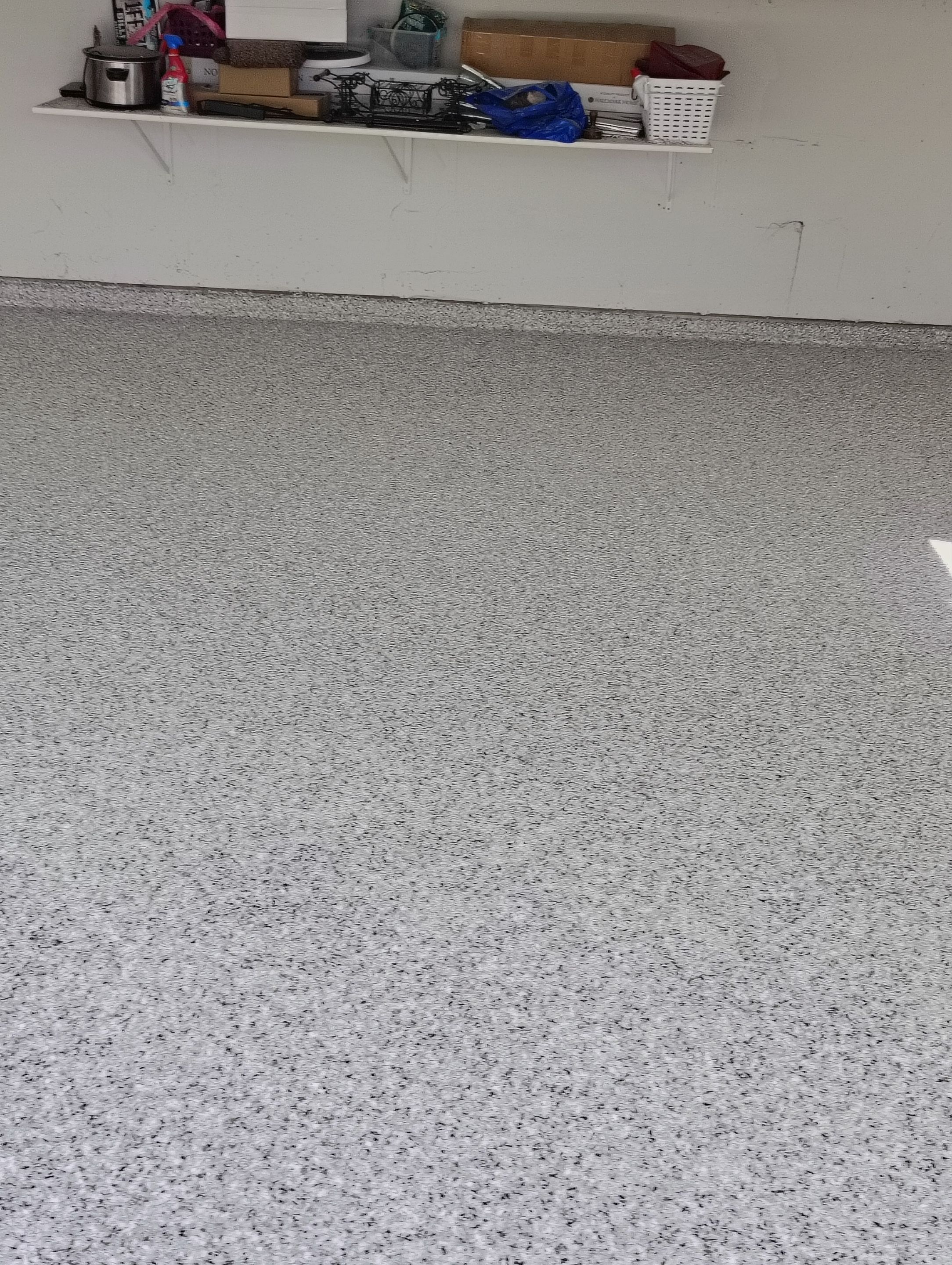 Decorative Chip Epoxy Garage Floor Coating in Sioux Falls by Select Painting, Coatings & Garage Cabinets
