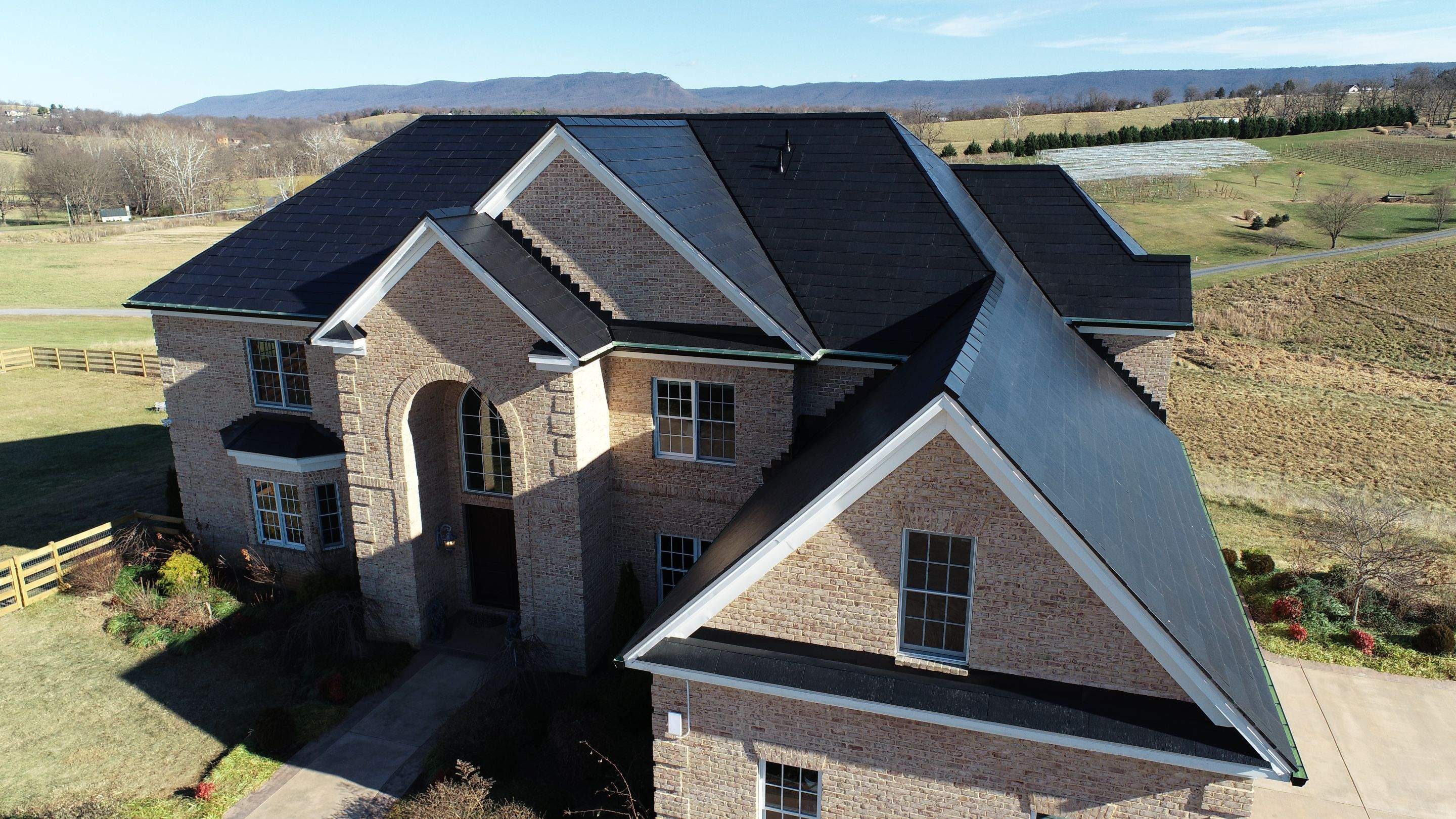 Tesla Solar Roof Replacement  by American Home Contractors