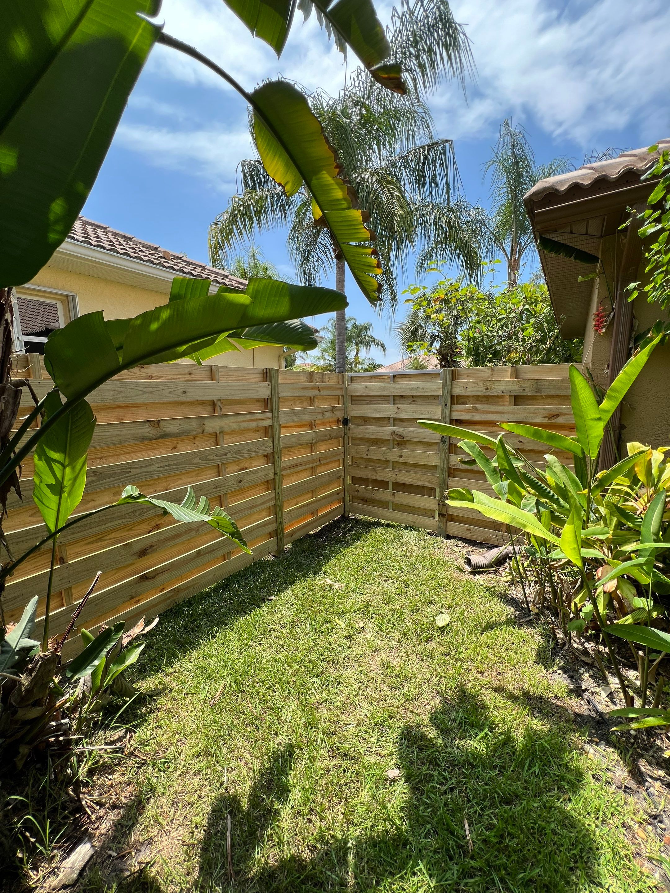 Osprey, FL 6ft. Tall Treated Horizontal Shadowbox Wood Fence by Asap fence and gates, LLC
