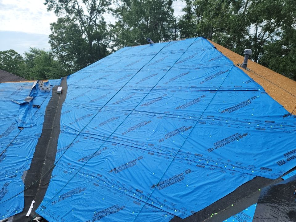 Residential Roofing Installation using Roof Replacement by American Roofing & Construction LLC