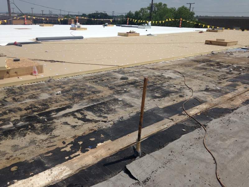 Massive Storm Damage Project - Factory in Arlington by First United Roofing & Construction