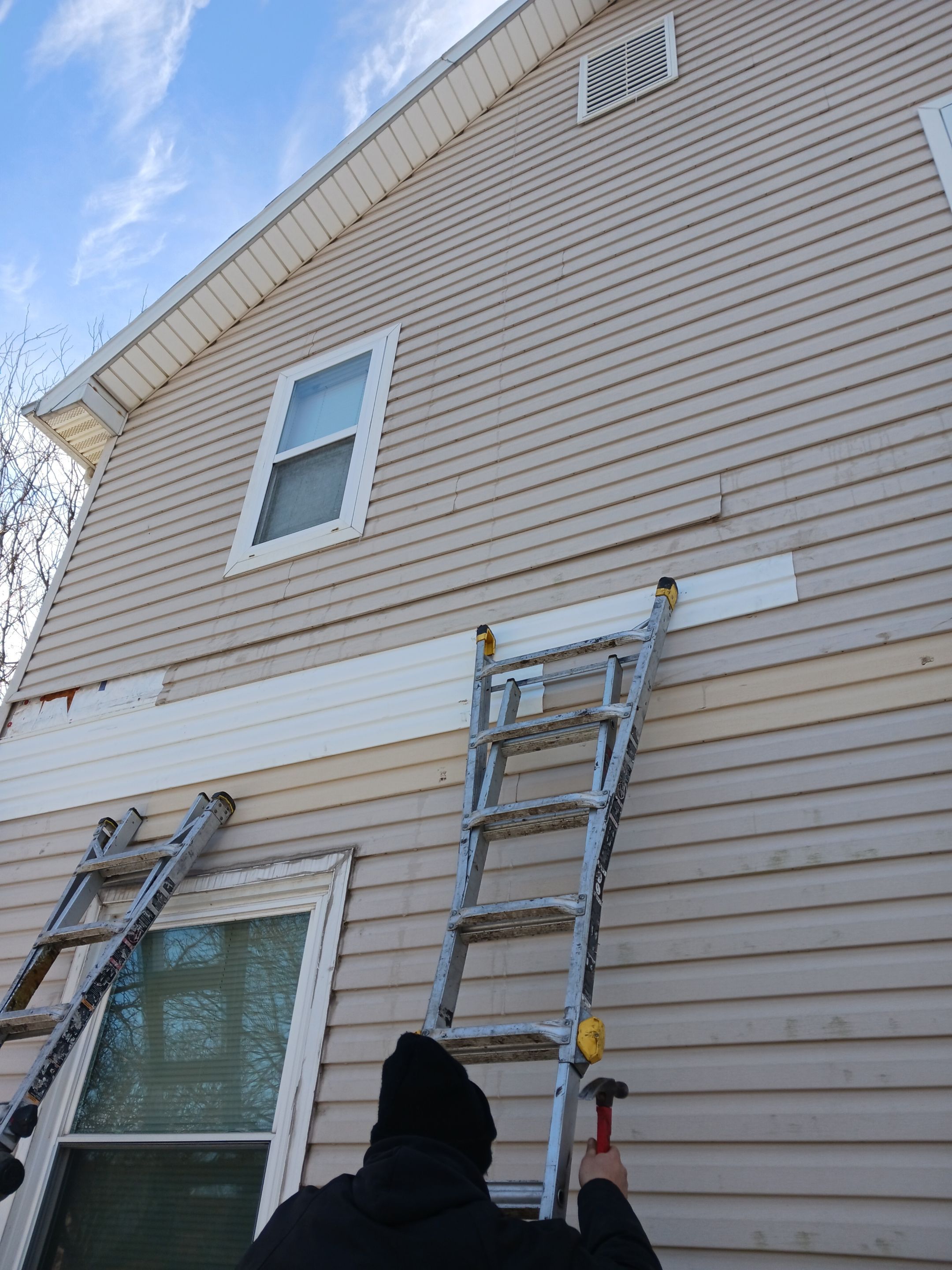 Wind damage to Siding: Insurance paid for full replacement of all siding by Absolute Roofing and Construction