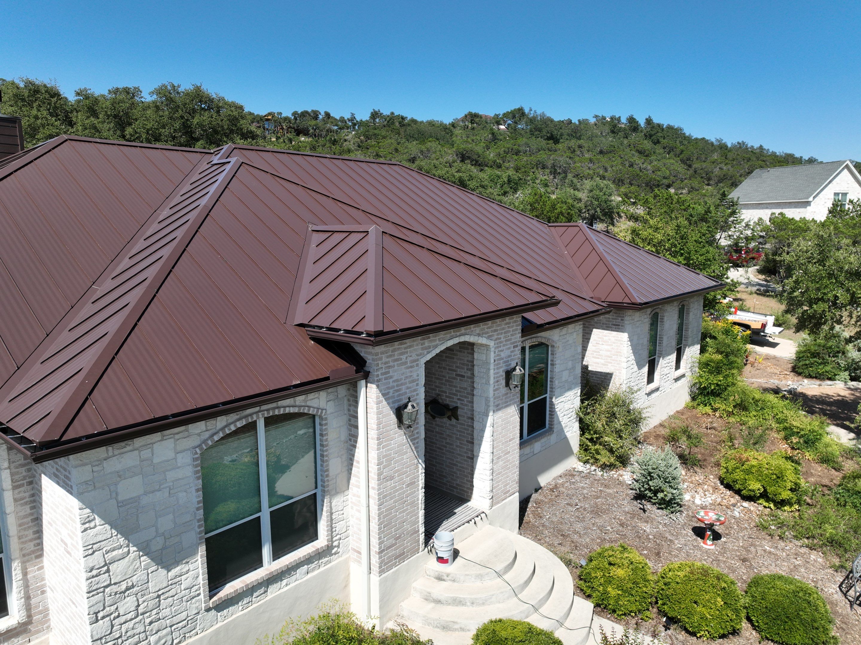 Residential Metal Roof Installation using McElroy Metal by Premier Roofing and Contracting