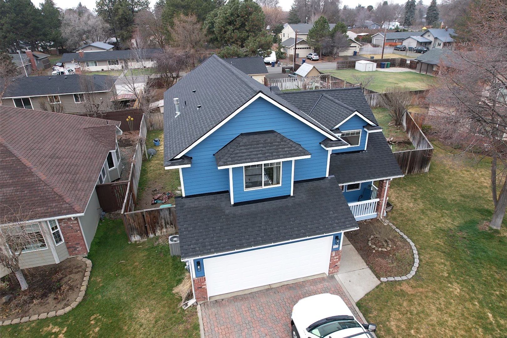 Alpine Roofing completed a roof replacement on Alder Street in Ellensburg, WA using Certainteed Landmark ClimateFlex Shingles in Moire Black.