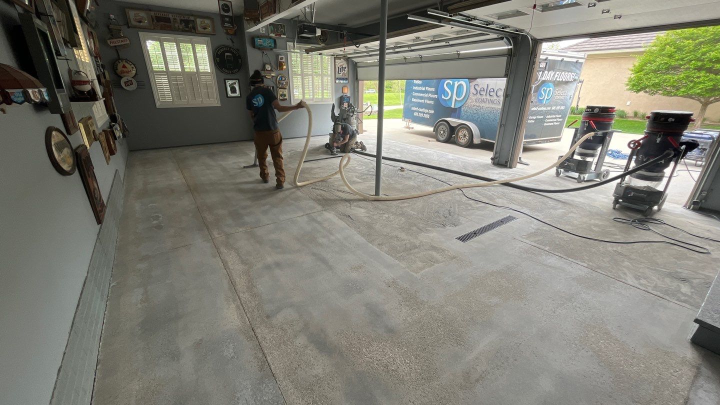 Garage using Orbit by Select Painting, Coatings & Garage Cabinets