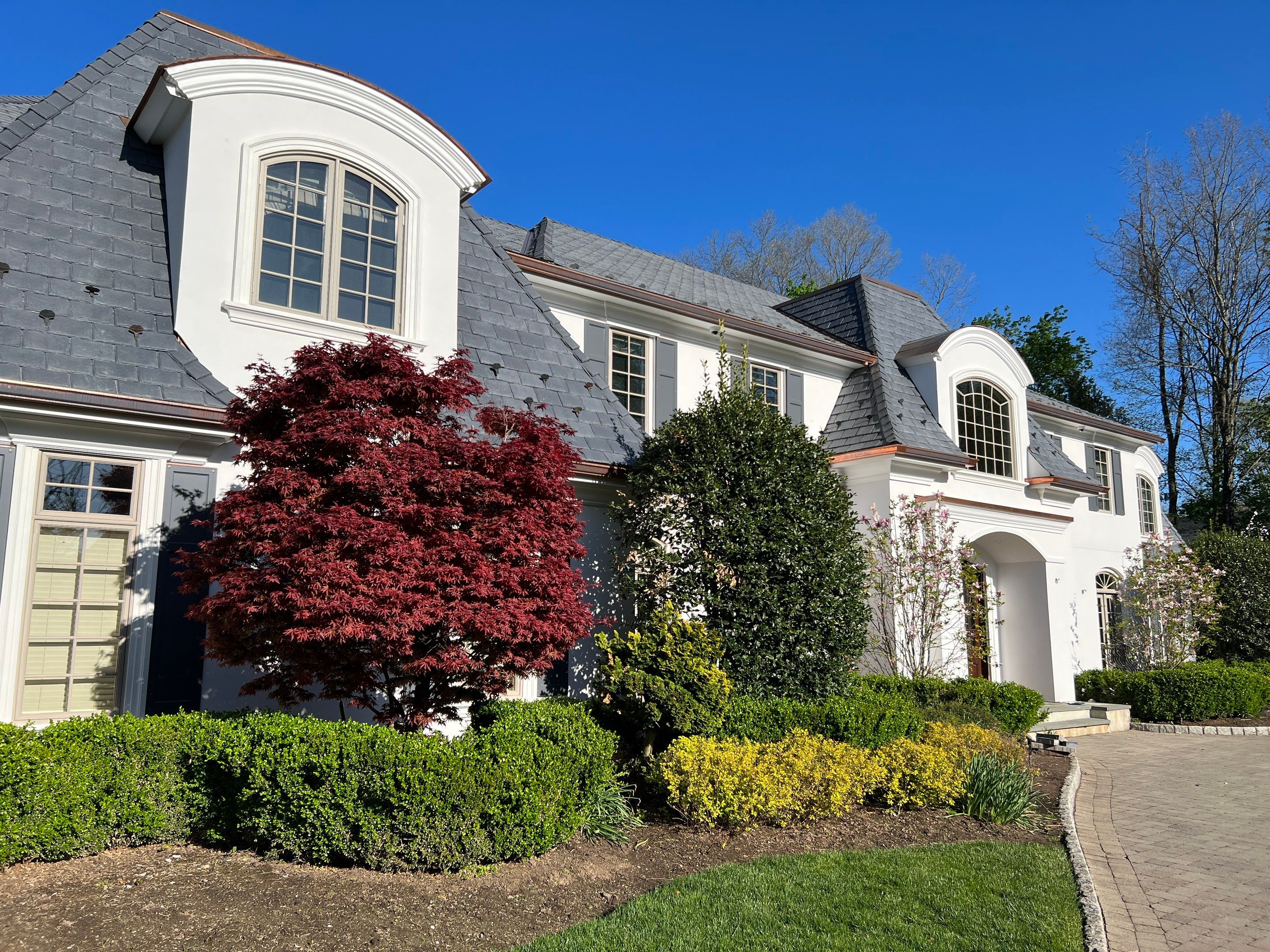 Full Slate - Stucco - Copper Remodel by USA Roof Masters