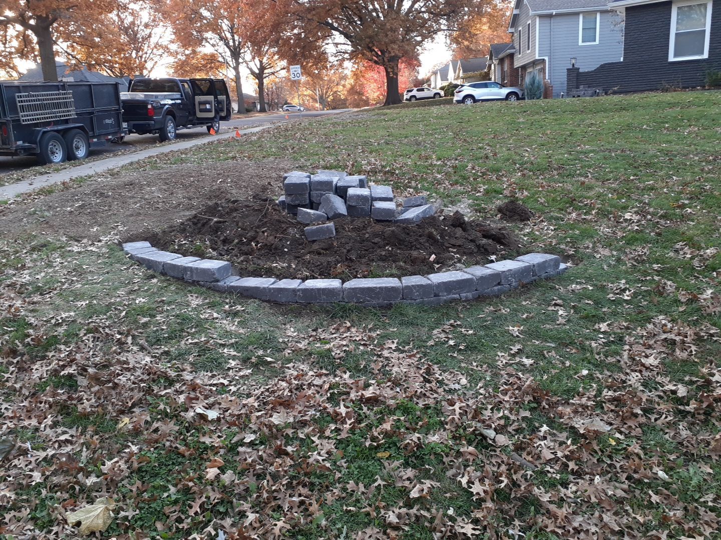 Entire Home Landscape and Retaining Walls by LAND ESCAPES LLC
