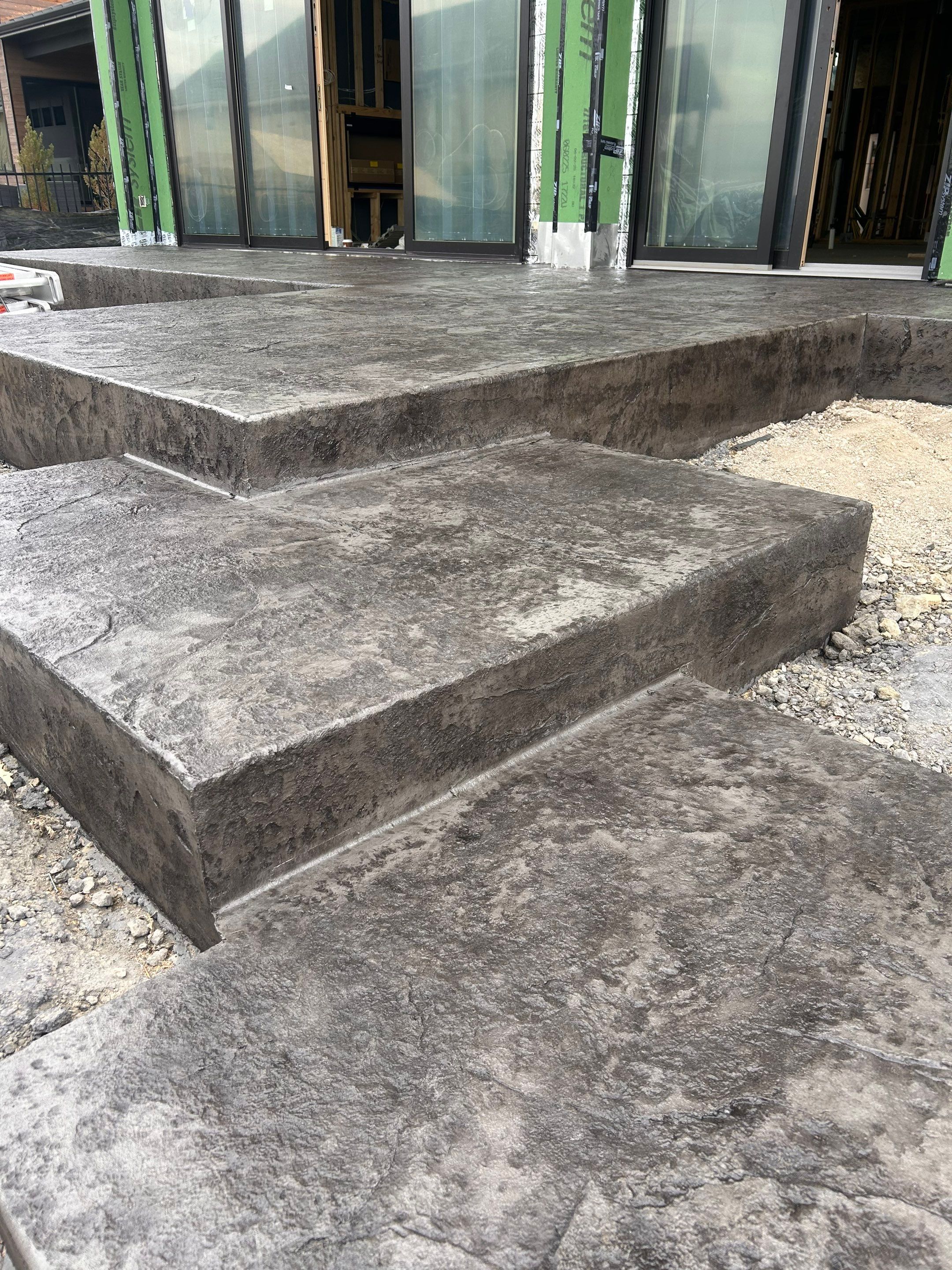 Stamped Concrete Patio and Custom Walkway Installation in Berthoud, Colorado by Center Line Concrete