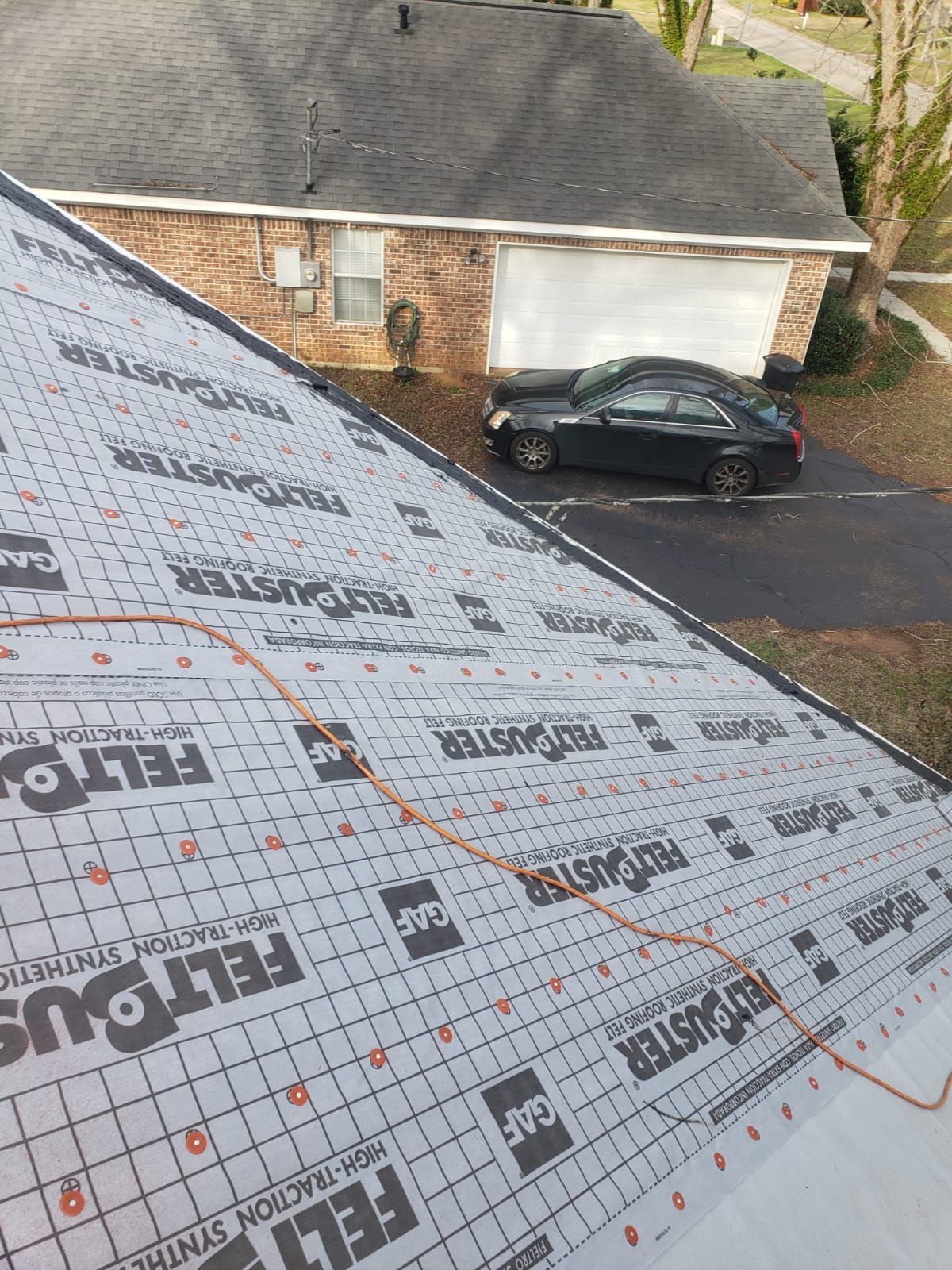 Residential Roofing Installation using Roof Replacement by American Roofing & Construction LLC