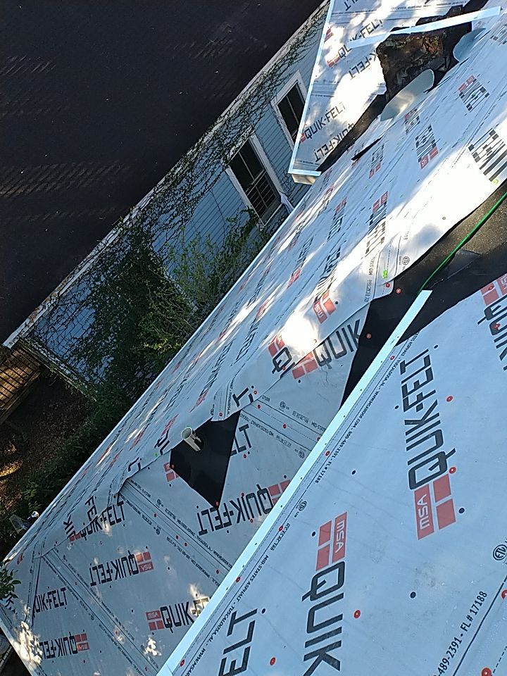 Residential Roofing Installation using Roof Replacement by American Roofing & Construction LLC