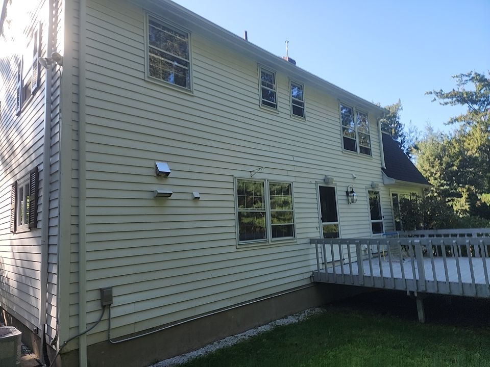 Custom window trim work and siding replacement in Dover, MA by UBrothers Construction