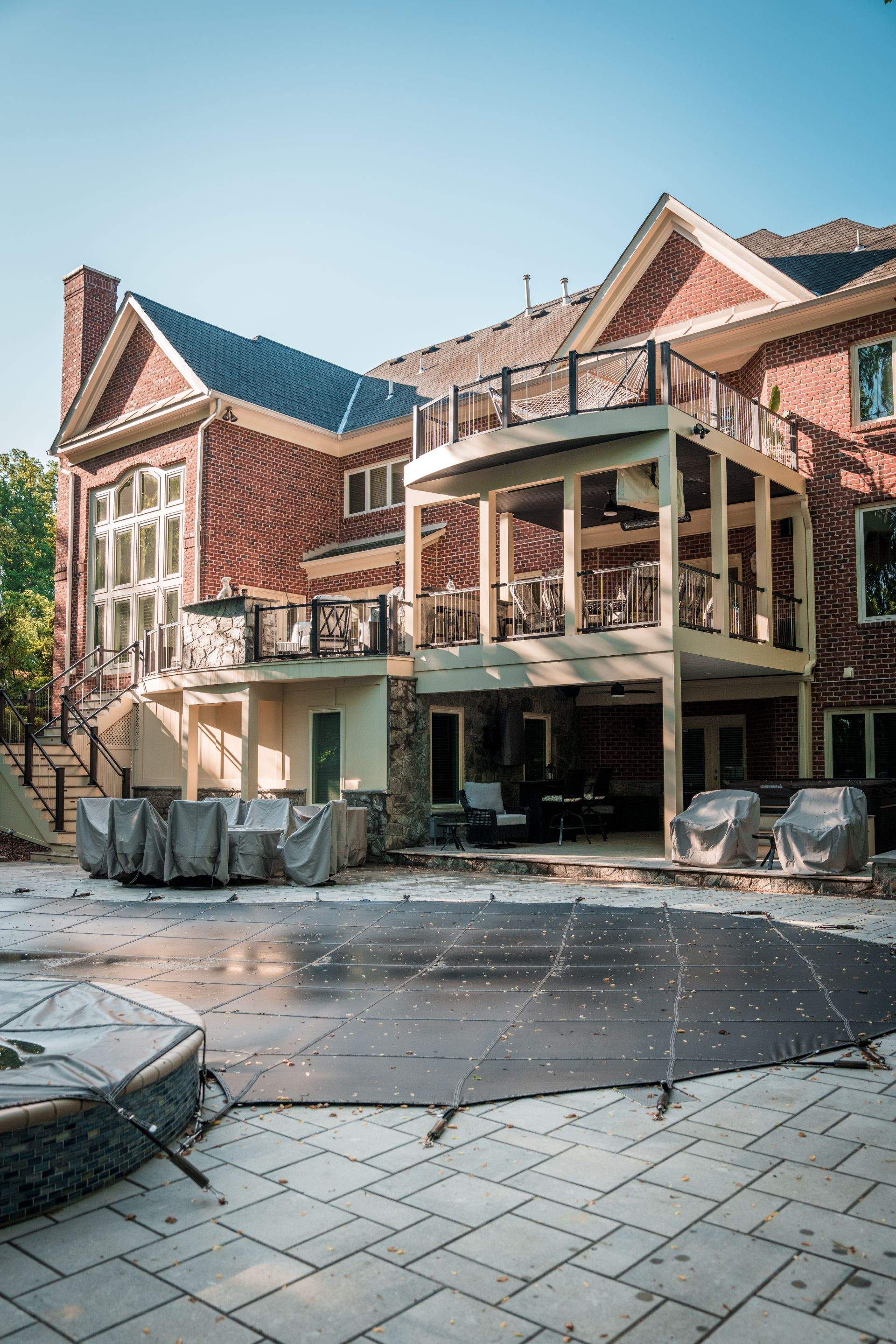 Custom Multi-Level Deck, Outdoor Kitchen & Pool Patio in McLean, VA by Sunburst Construction Inc