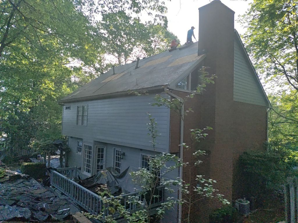 Residential Roofing Installation using Owens Corning Quary Gray by Inspector Roofing and Restoration