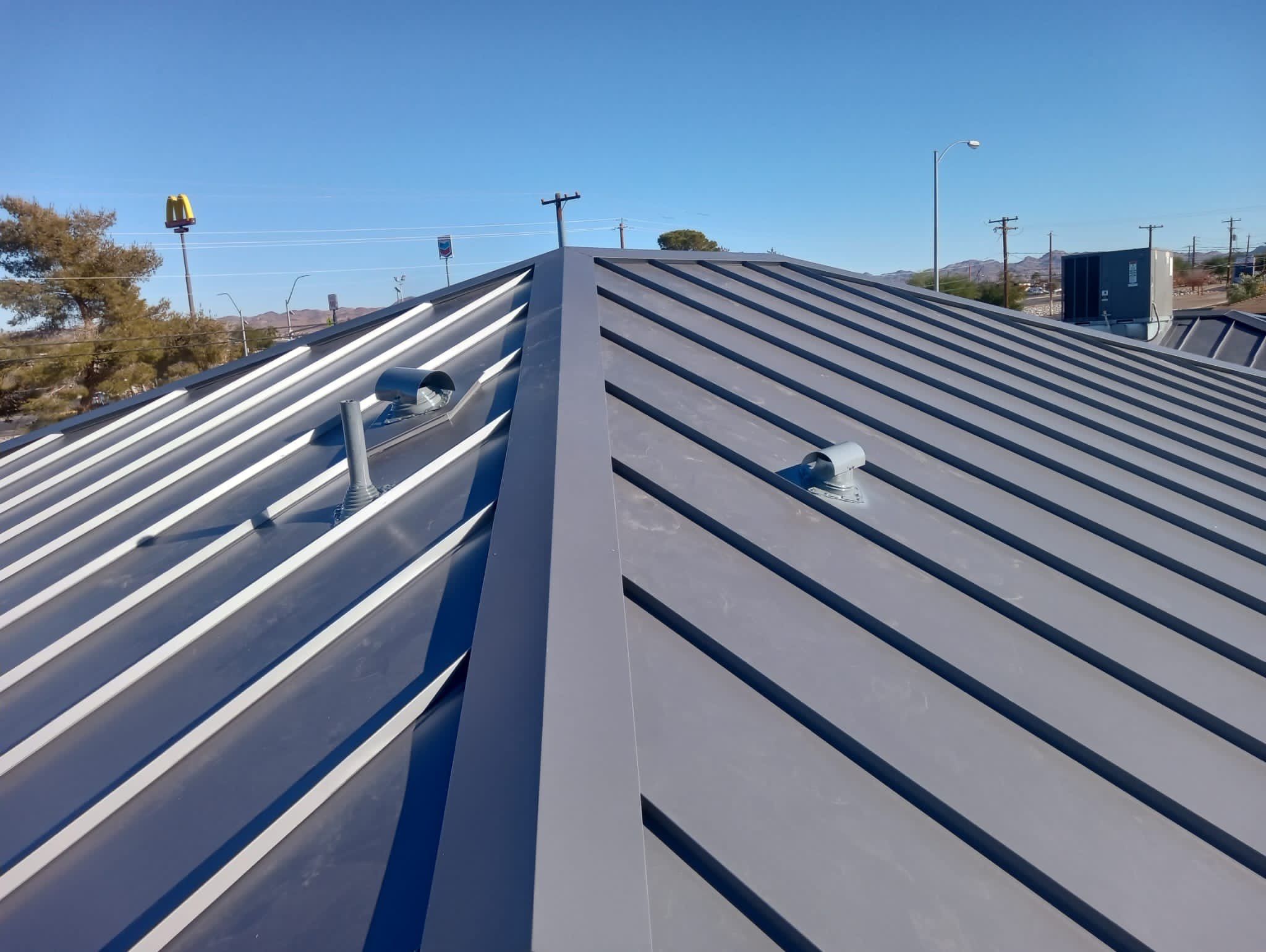 Charcoal Gray Standing Seam by Reimagine Roofing