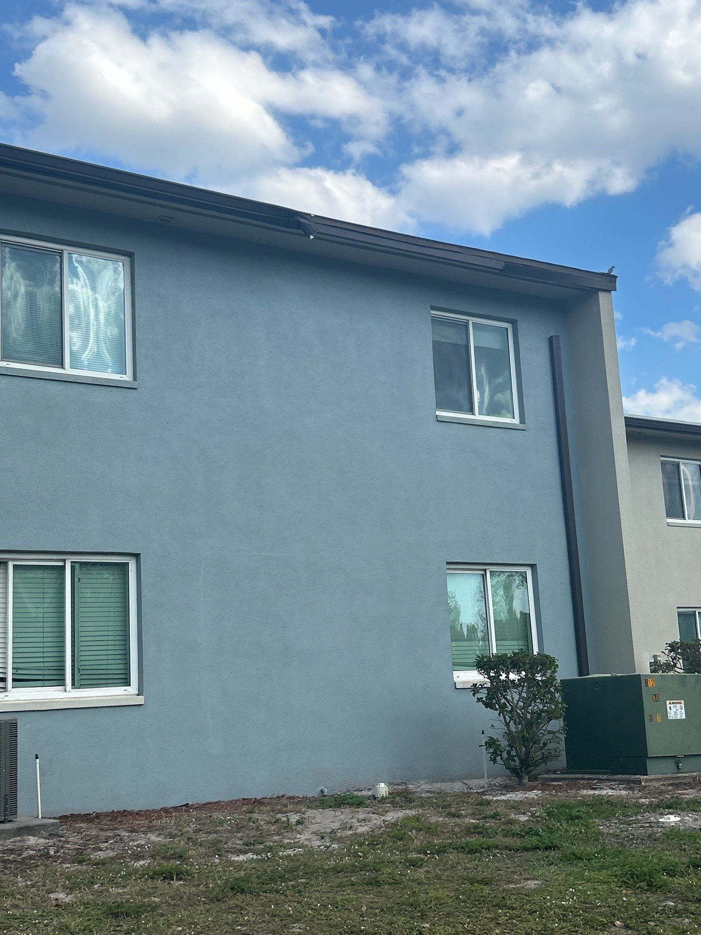 Black 7-Inch Seamless Gutters in Fort Myers FL by Gutter Professors