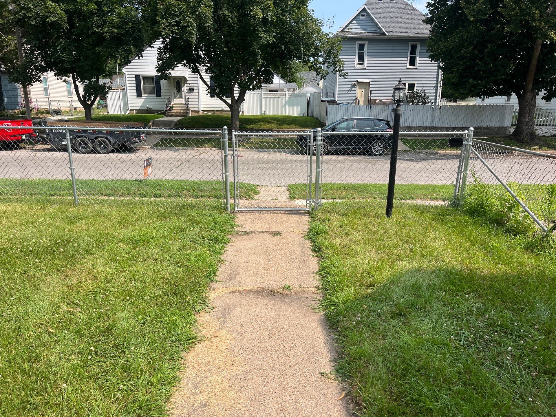 Galvanized Chain Link Perimeter Fence and Gate Installation in Waterloo by Perfect Picket Fence and Stain