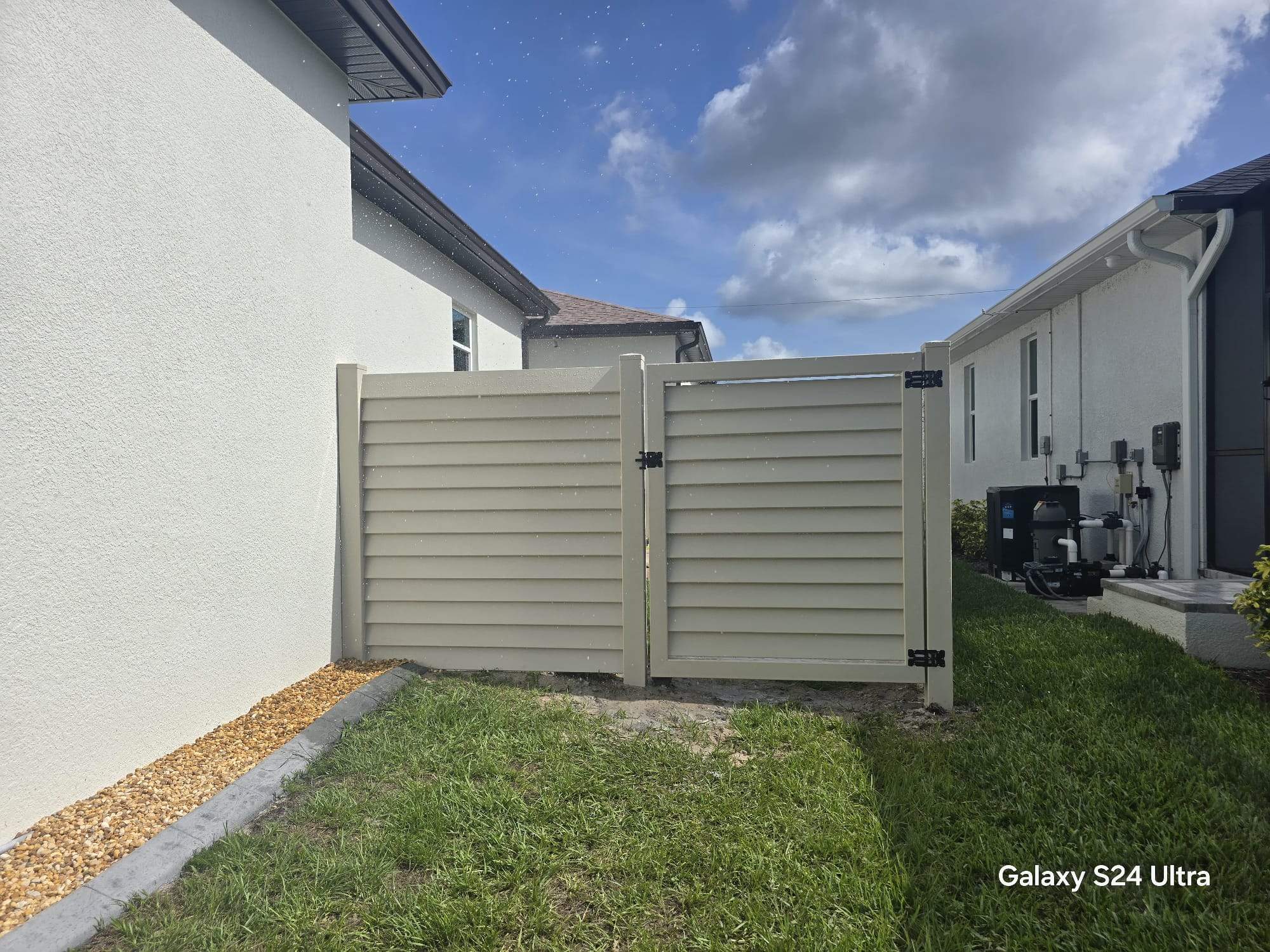 Tan Louvered Vinyl in Port Charlotte by True Fence LLC