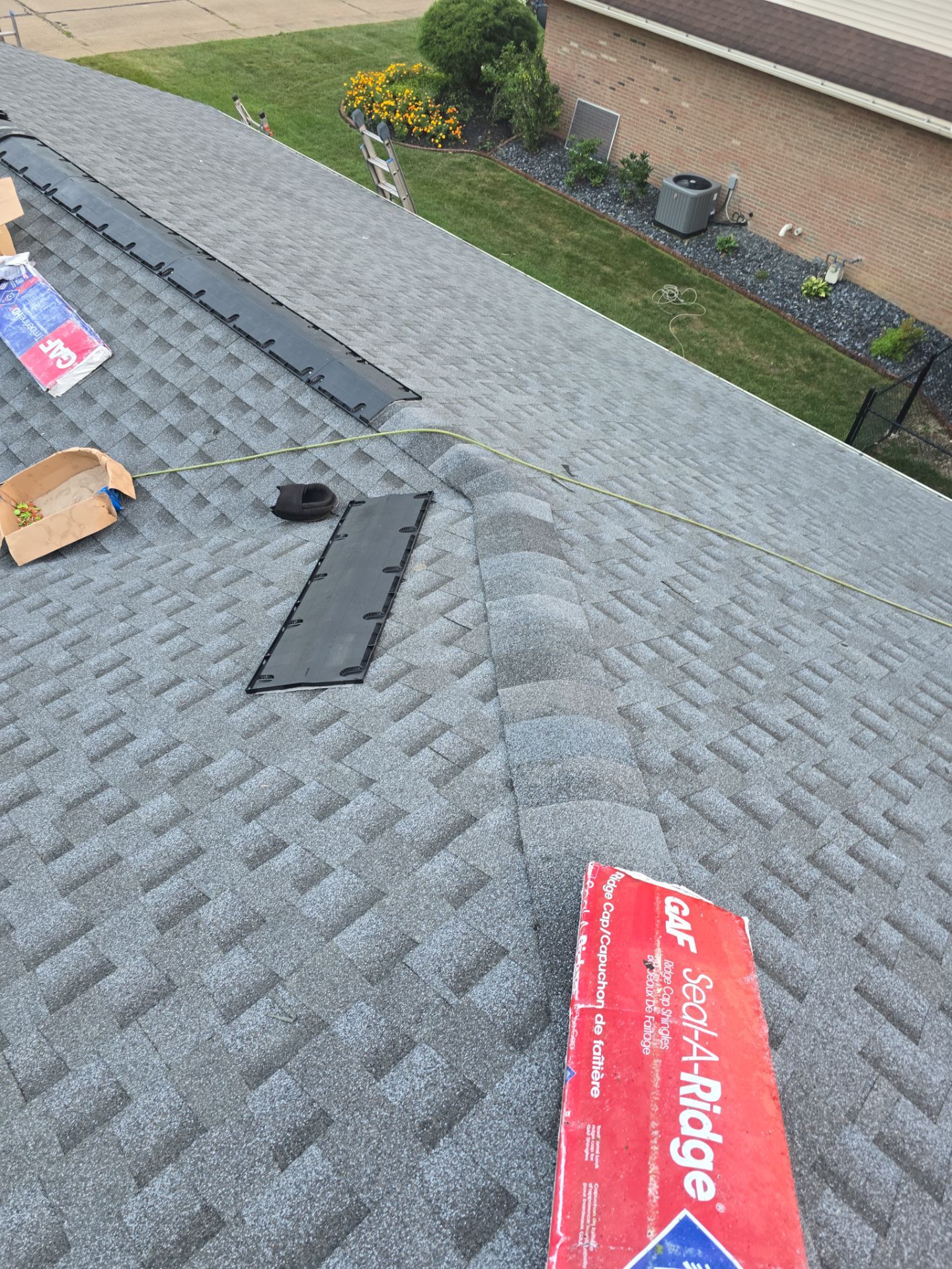 Residential Roofing Installation using GAF Timberline HDZ Pewter Gray by Rainstoppers Roofing
