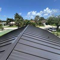 24ga 1.5" Mechanical Seam Dark Bronze by Total Roofing System The Metal Roof Experts