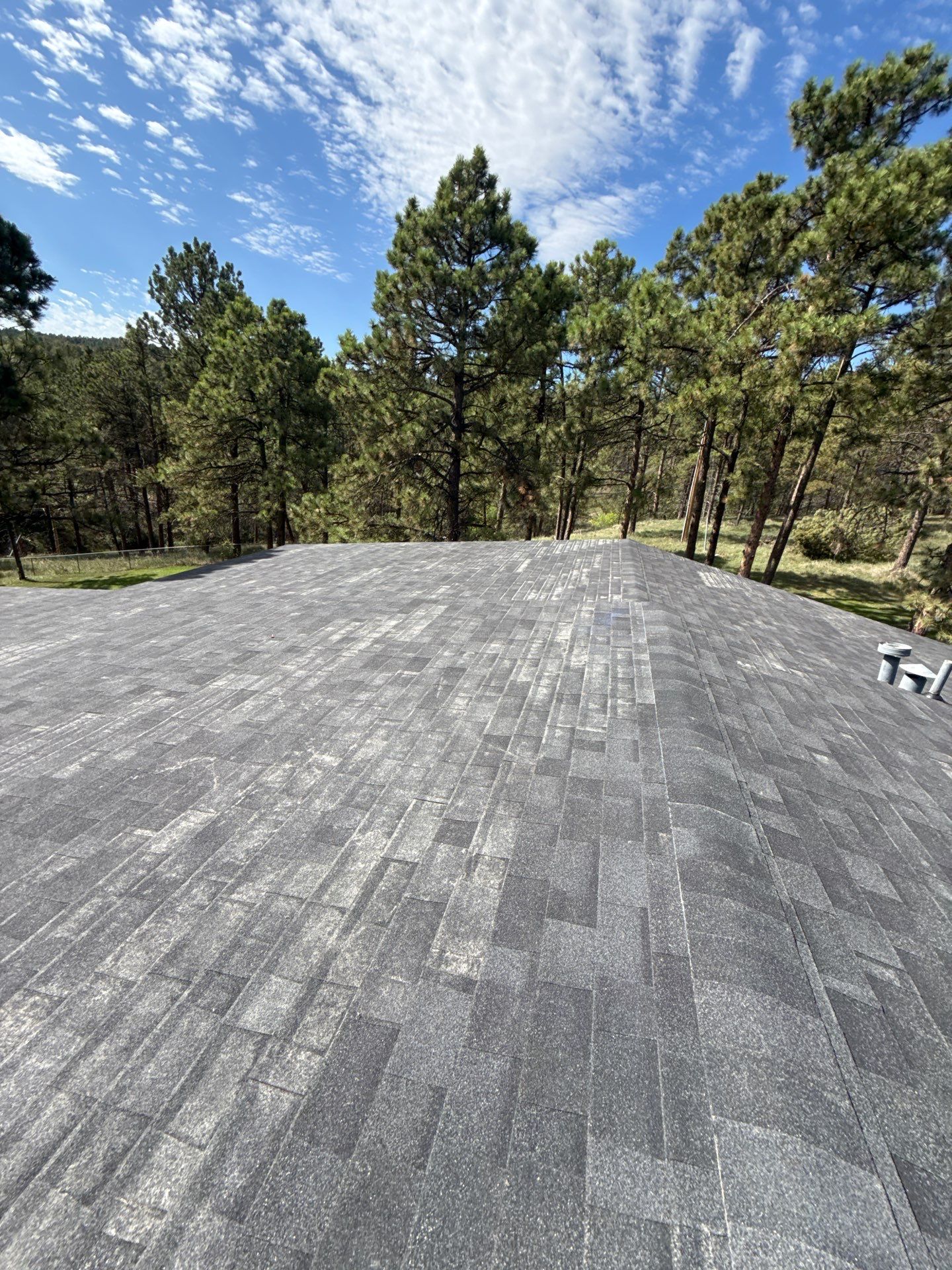 Full Architectural Shingle Installation for Contemporary Rapid City Residence by Weather-Tite Exteriors LLC