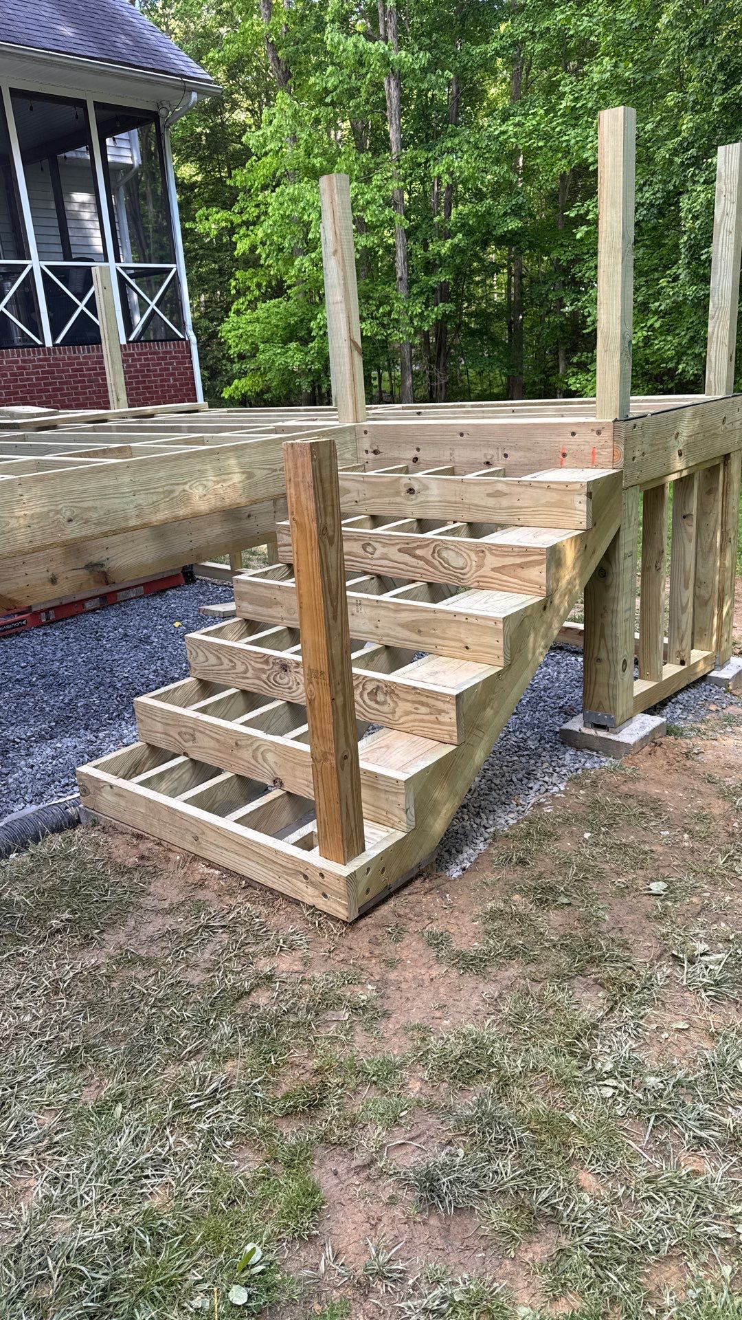 Custom Composite Deck and White Vinyl Railing Installation in Fayetteville by Walnut Hollow Decks & Outdoor Living