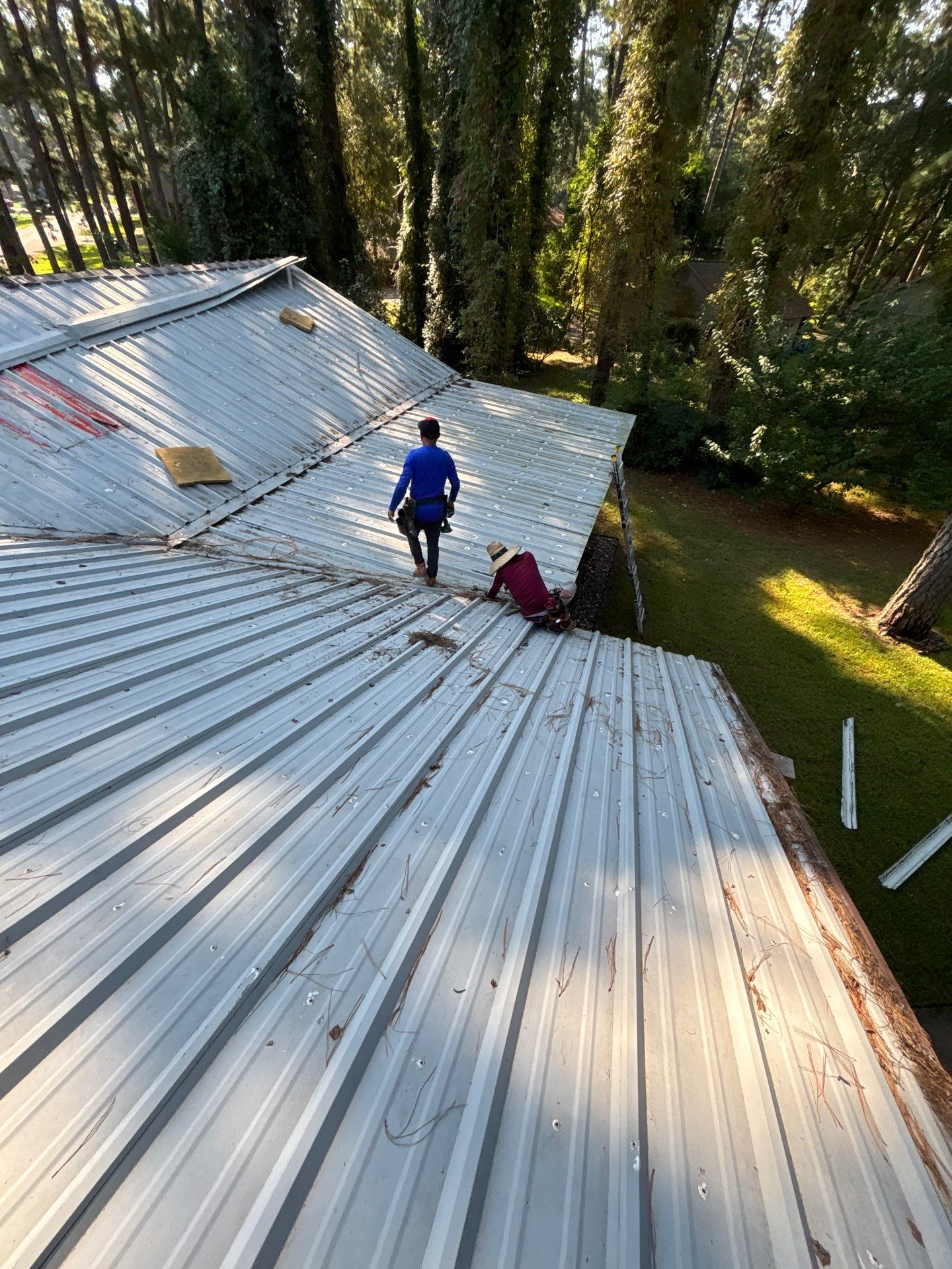 White Standing Seam Metal Roof Replacement in Willis, Texas by Abbott Roofing Company