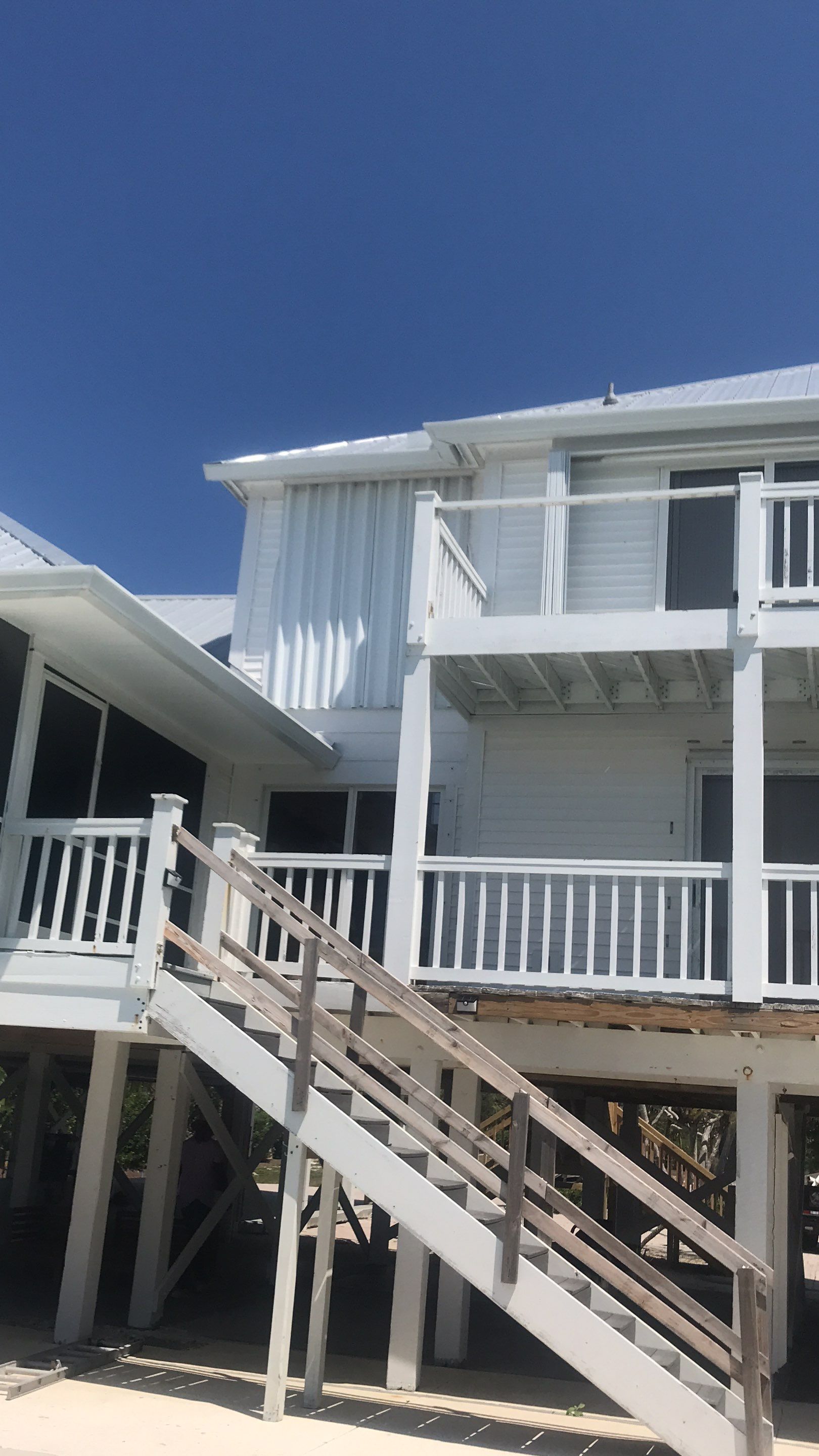 Downspout Installation using Downspout Extension in Sanibel FL by Gutter Professors