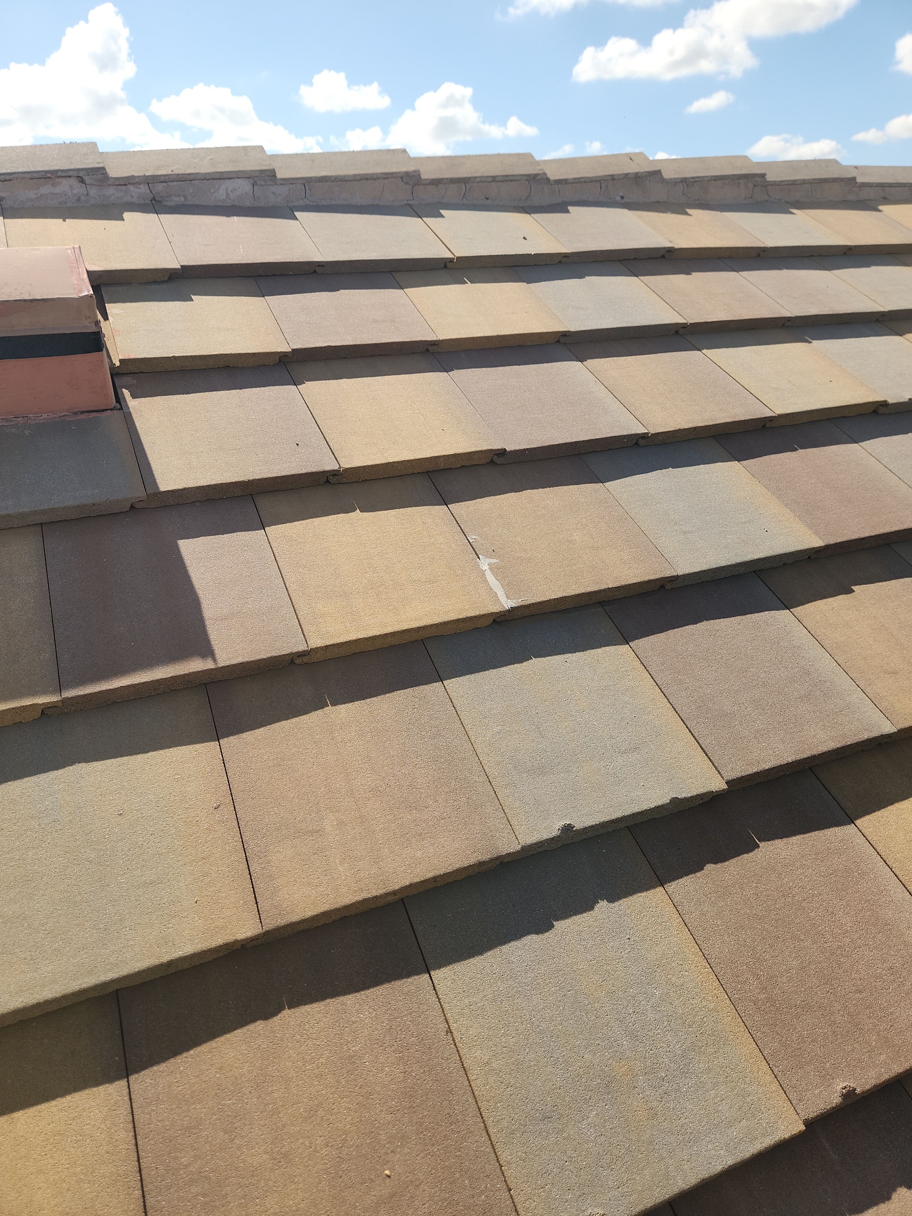 Concrete Tile Roof Repair for Residential Home in Wellington by Aastro Roofing
