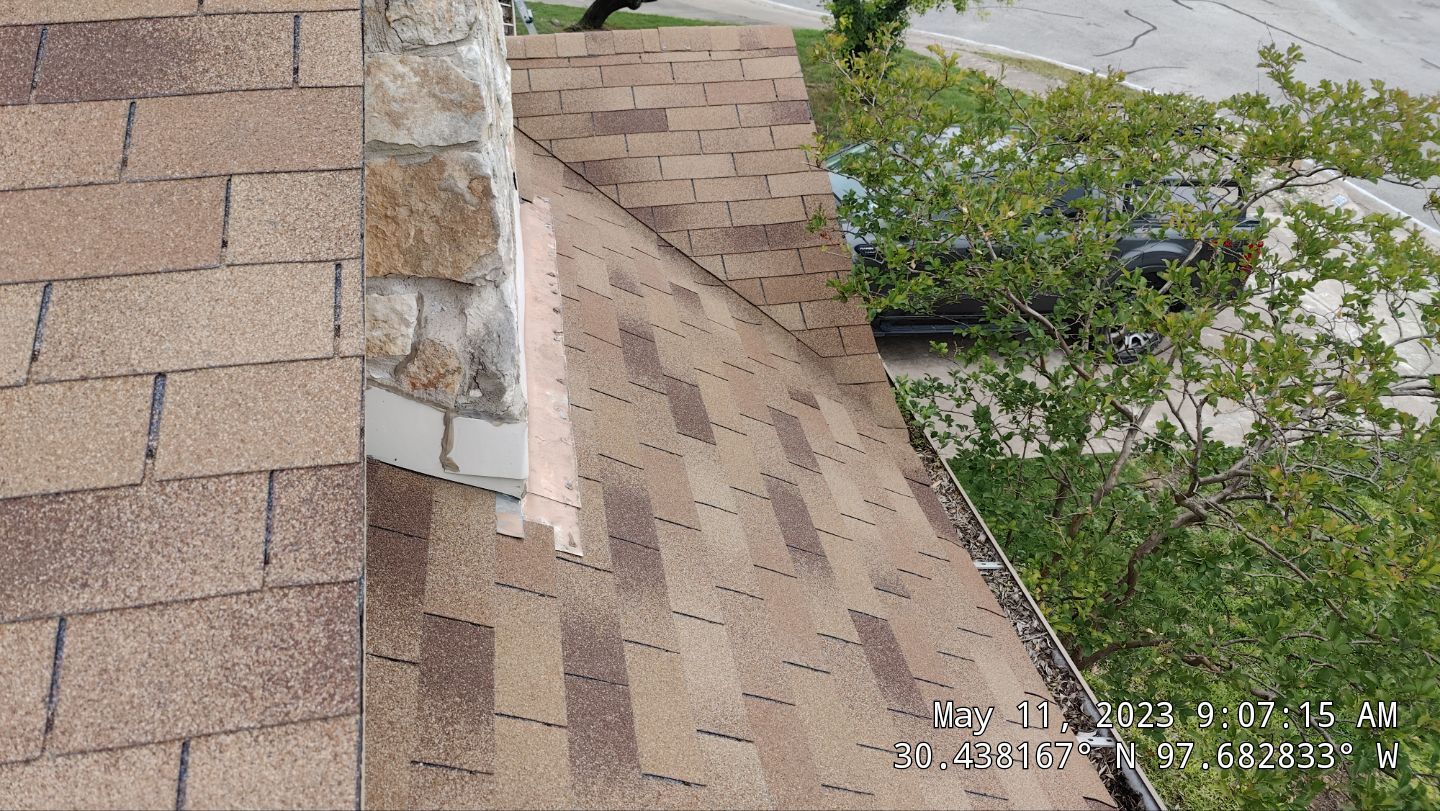 New Roof Installation Of IKO Dynasty Color Brownstone by DeZign Roofing & Exteriors