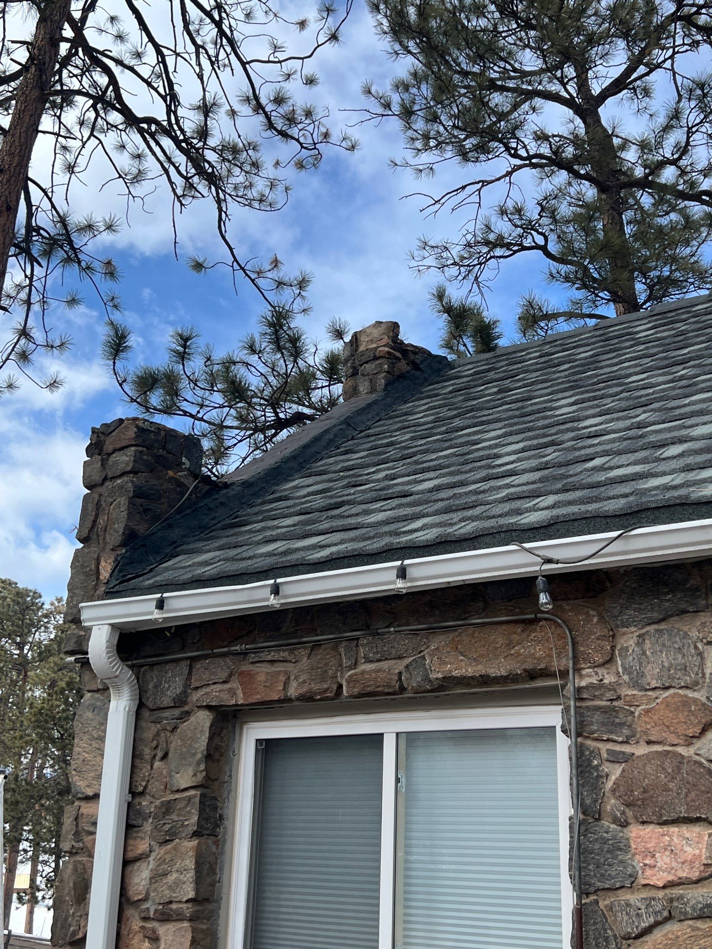 Residential Roofing Installation using Stone Coated Steel by Blue Peaks Roofing LLC 