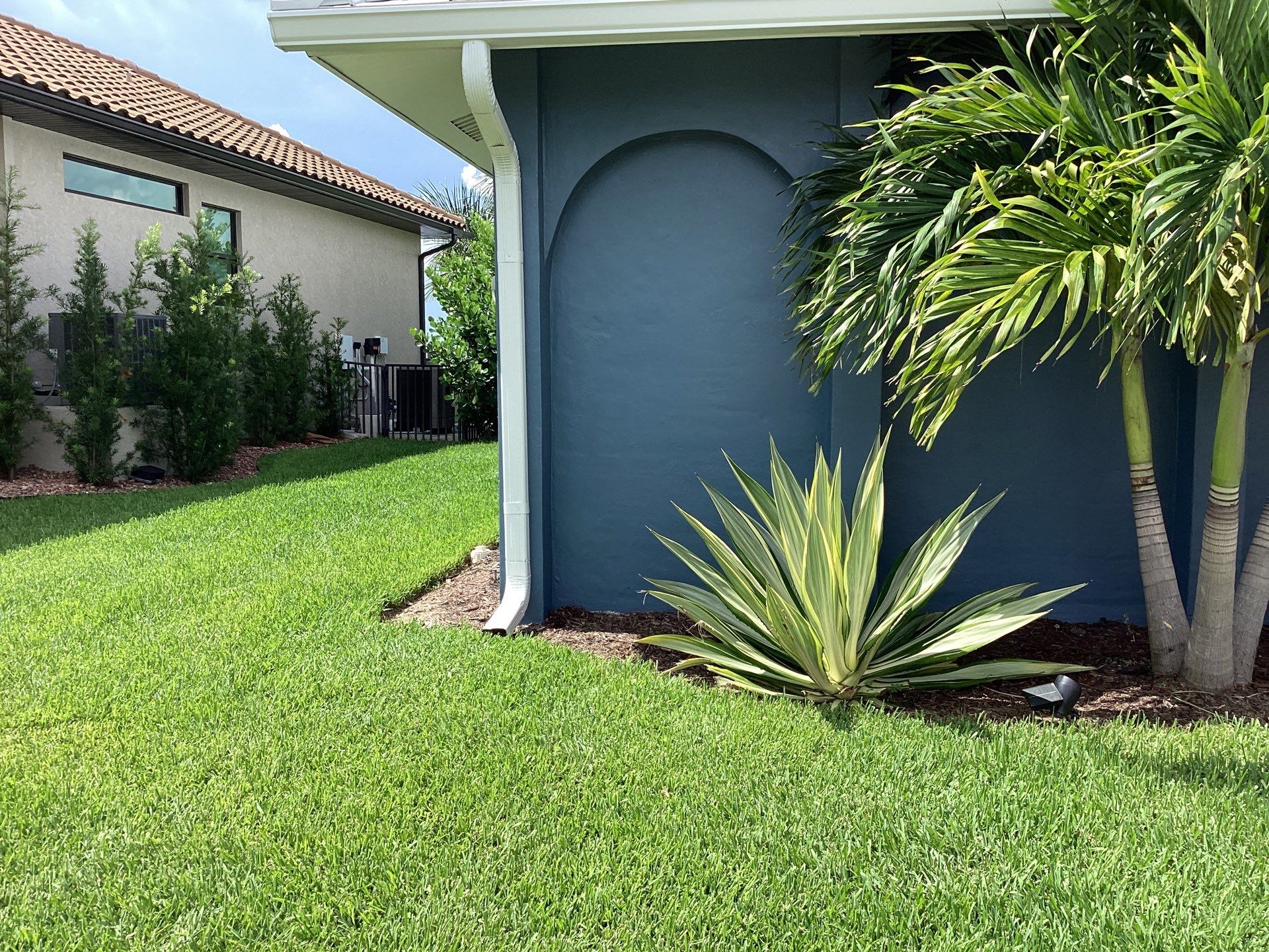 White Downspouts and Gutters Combo in Punta Gorda FL by Gutter Professors