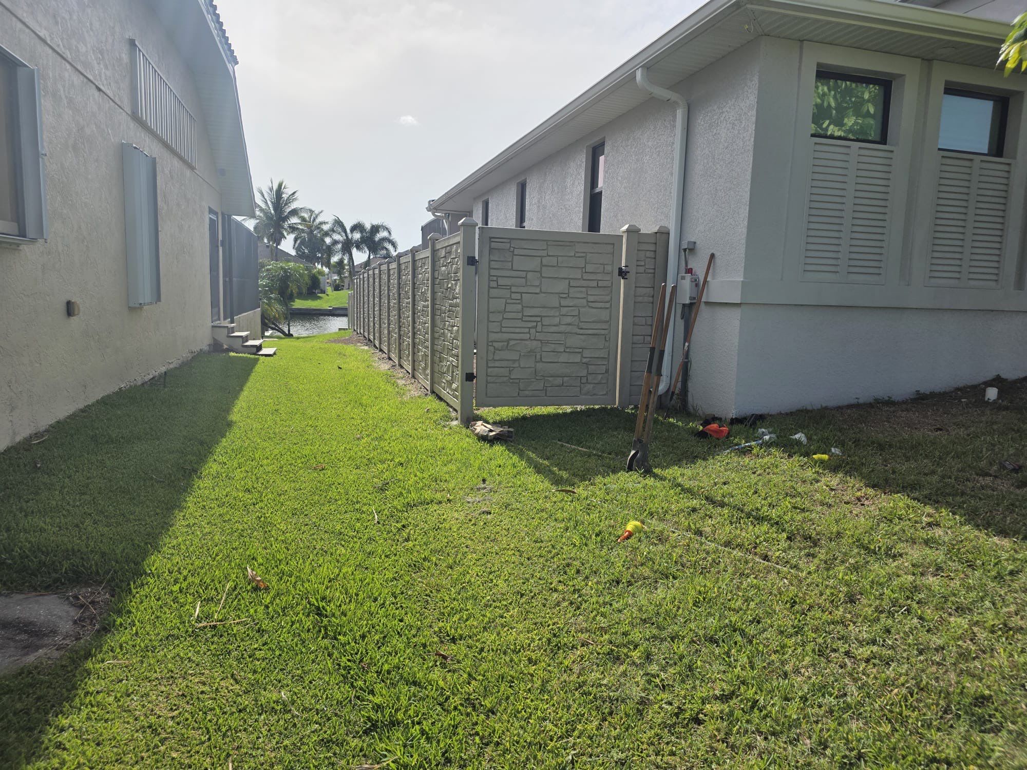 Waterfront Composite Privacy Fence Installation in Port Charlotte by True Fence LLC
