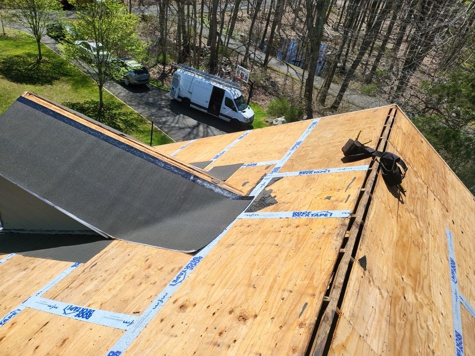 Residential Roofing Installation using onyx black by A Plus Exterior