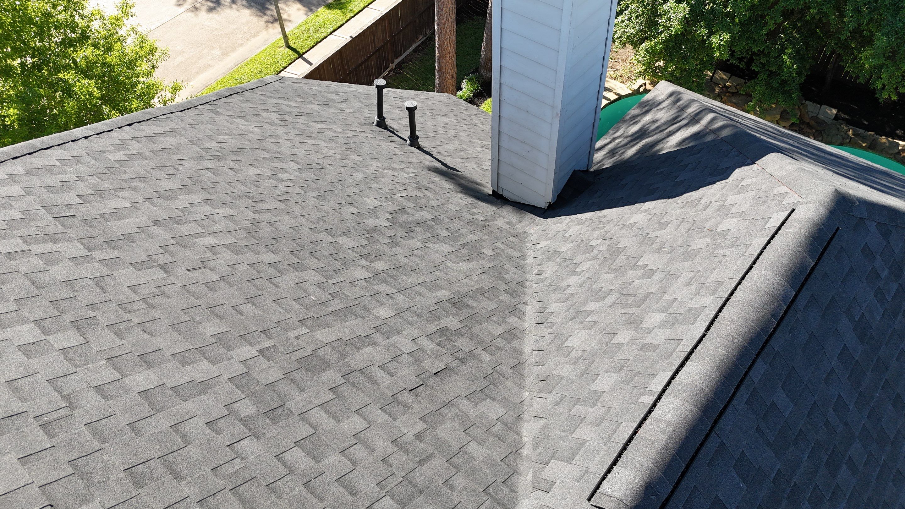 Residential Roofing Installation using Architectural Shingles by Core Four Roofing