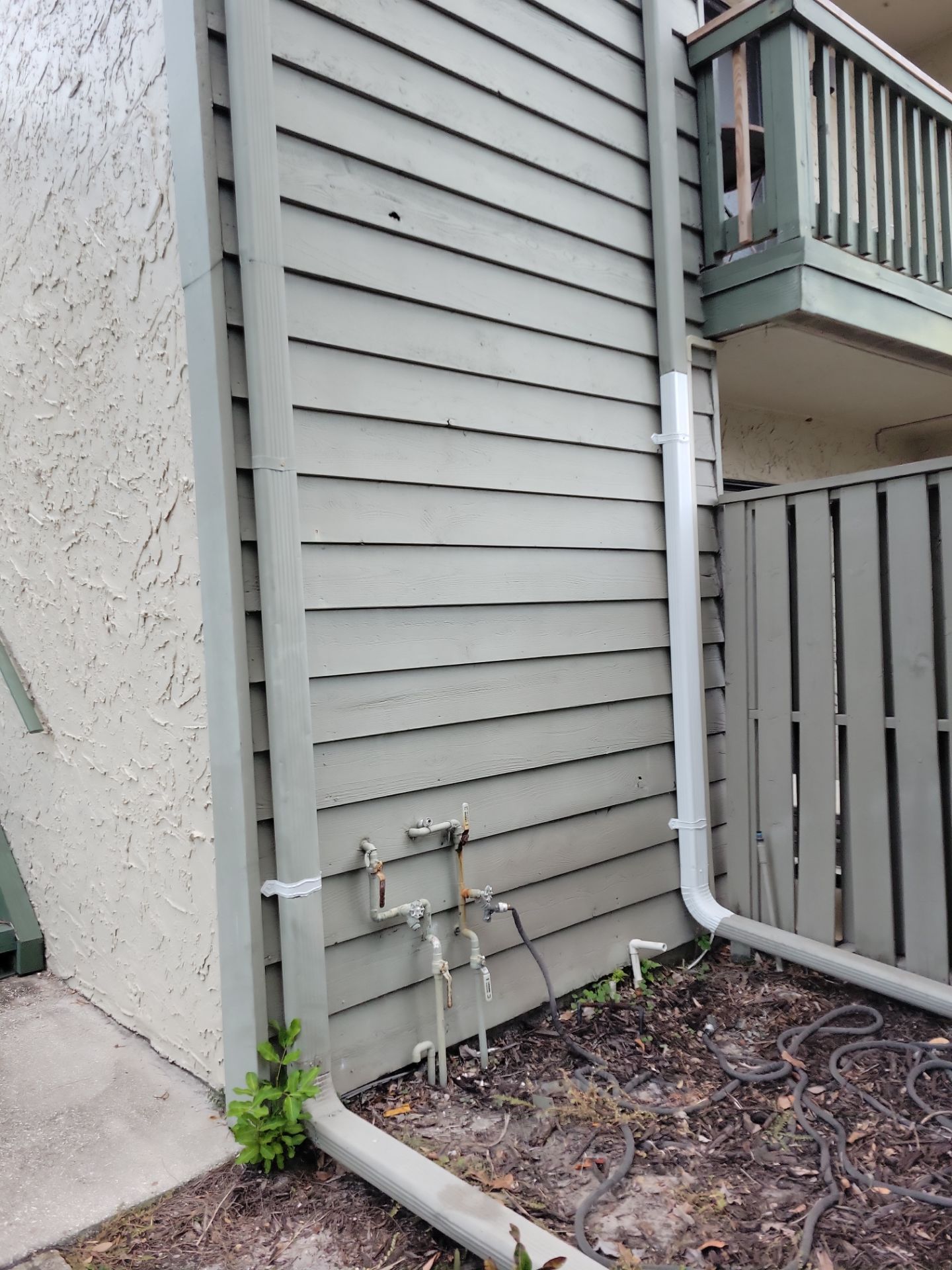 White Gutters Repair and Installation in Sarasota FL by Gutter Professors