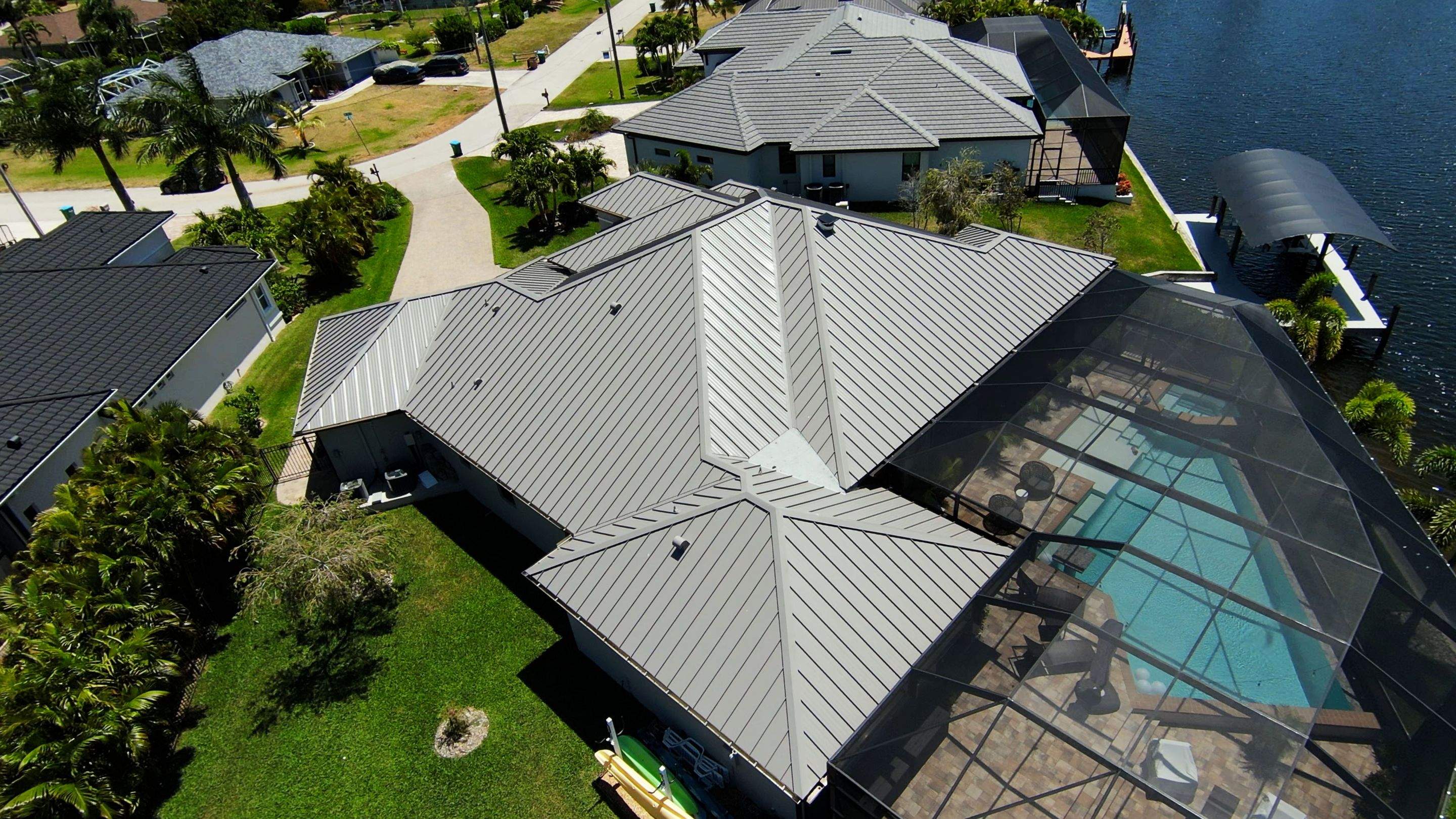 Residential Roofing Installation using Gulf Coast Metals Gulf Seam Panels by Four Peaks Roofing