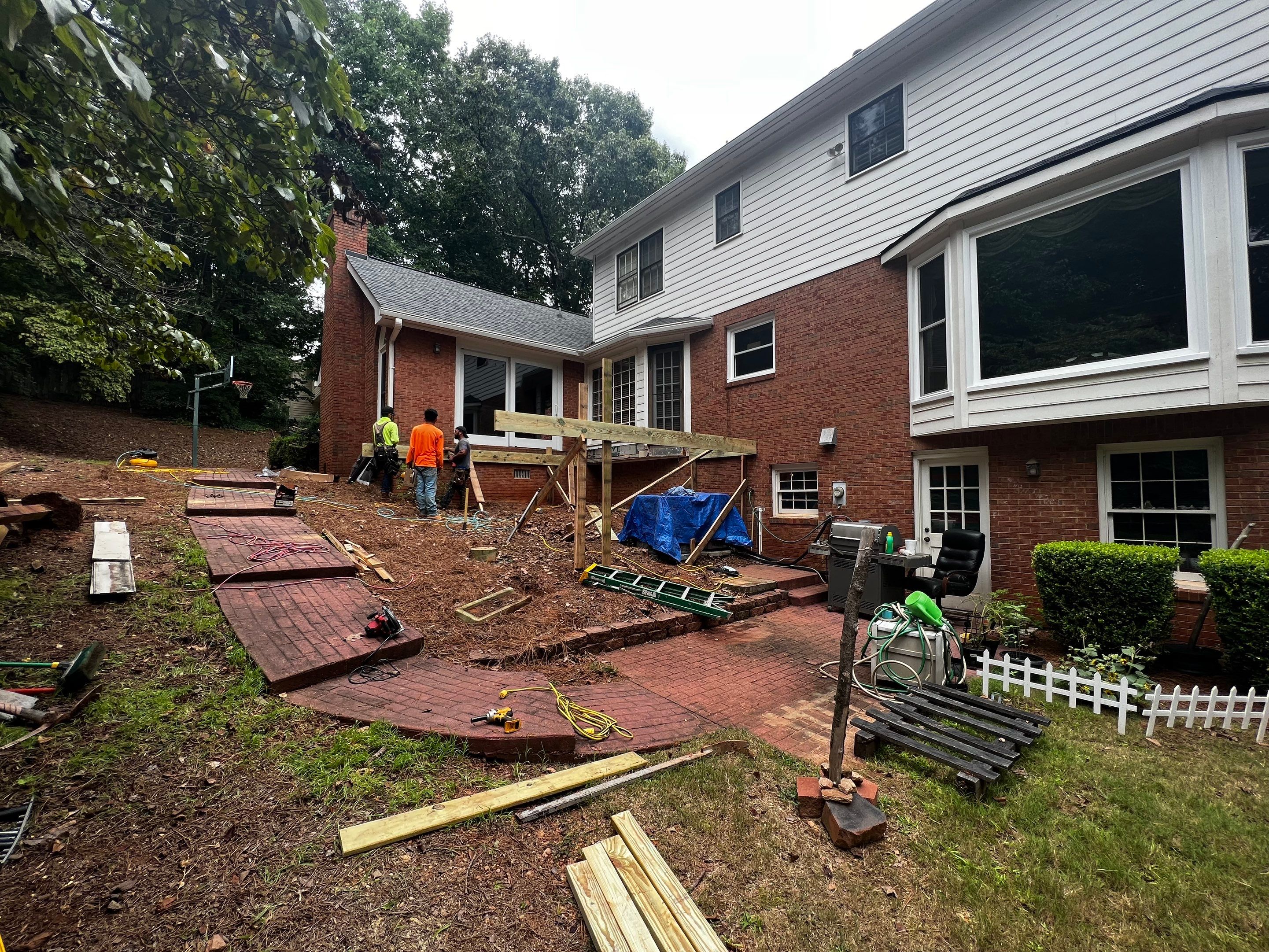 Elevated Composite Deck Installation with Metal Railings in Atlanta by Swift Home Renovations