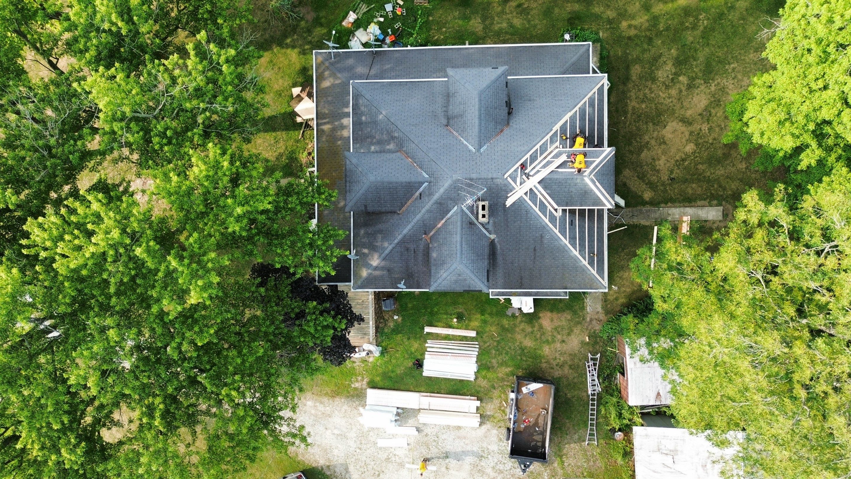 Residential Roofing Installation using Performance Panel Metal - Copper Metallic by RoofX 