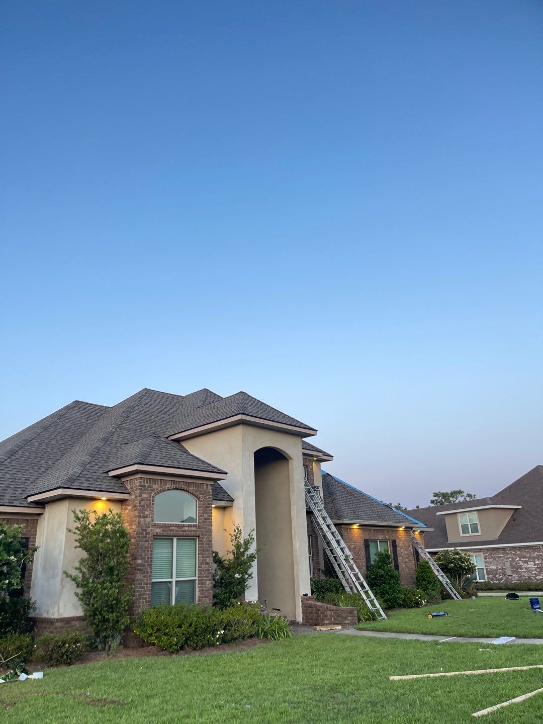 Residential Roofing Installation using Roof Replacement by American Roofing & Construction LLC