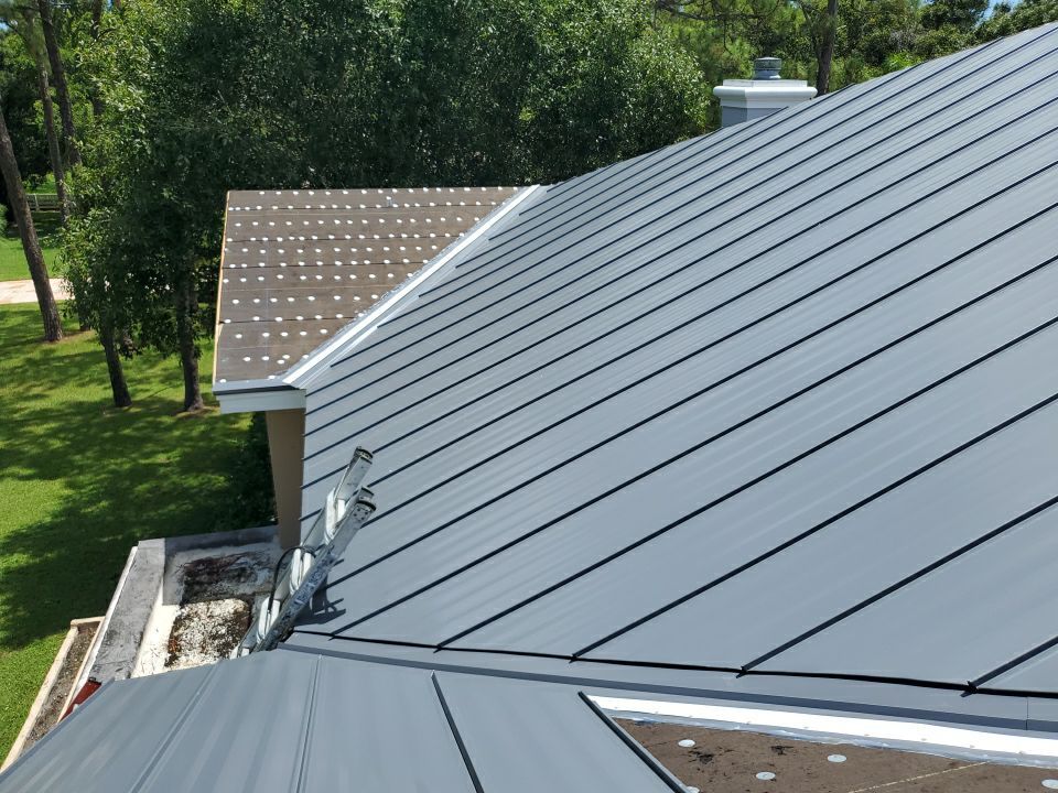 Residential Roofing Installation using 1" Nail strip metal roof by BLUES BROTHERS ROOFING