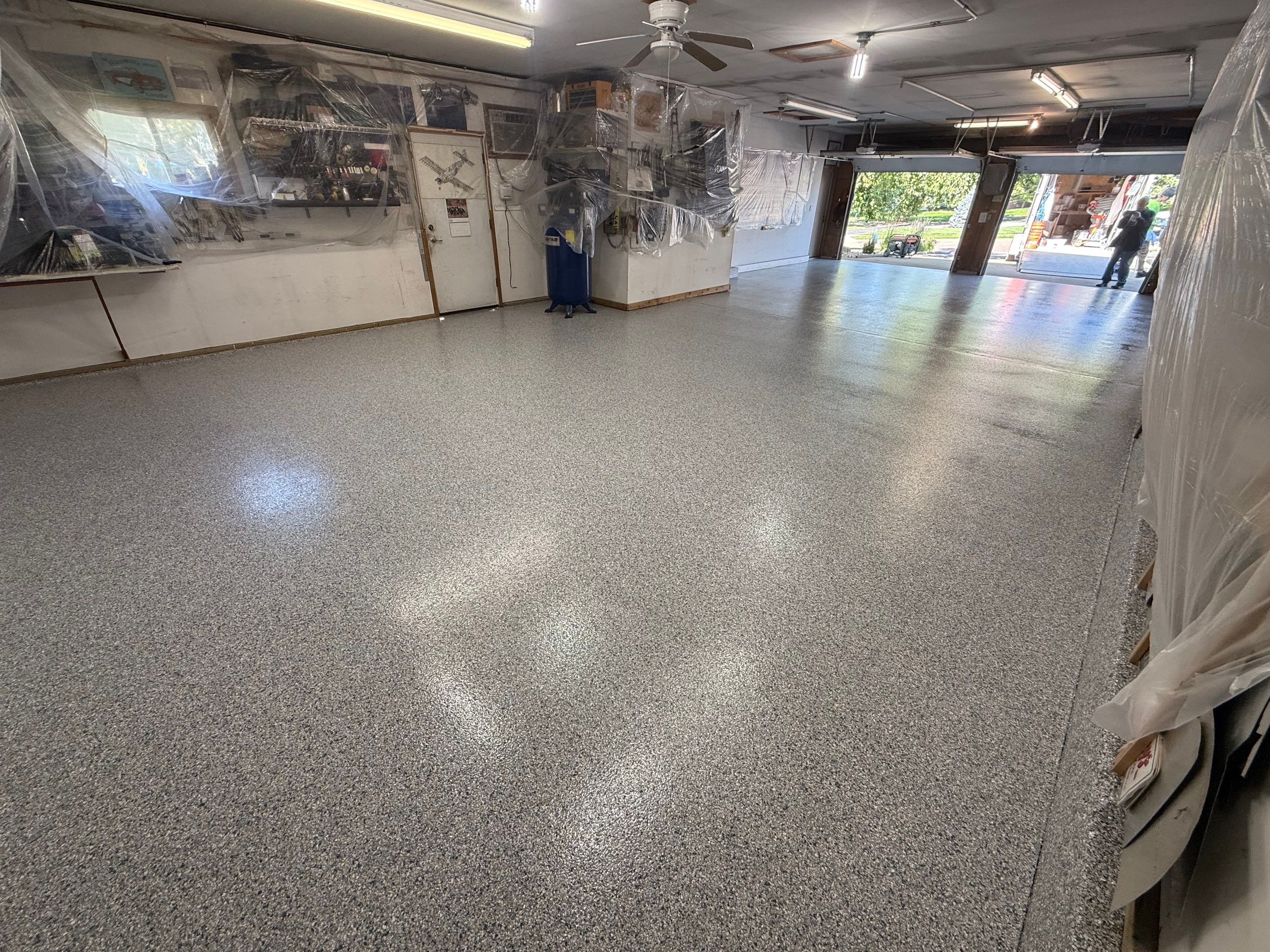 High-Performance Polyurea Garage Floor Coating and Stem Wall Finishing in Sioux Falls