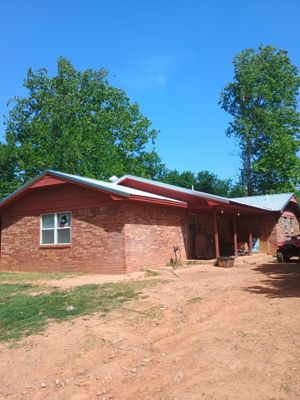 Corrugated Metal Roof Repair for Brick Home in Lindsay